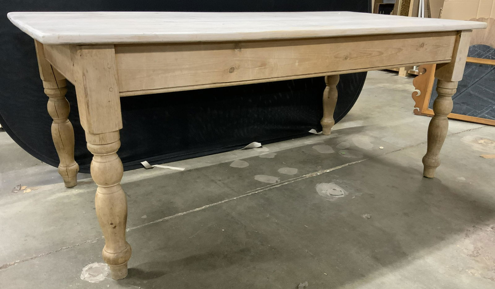 Custom Made Country French Farm Table: Heavy and Solid piece, with gray washed top, and light toned, picked wood turned legs. Table coordinated with ladder back chairs also available for sale in this auction. Bespoke dining table, kitchen