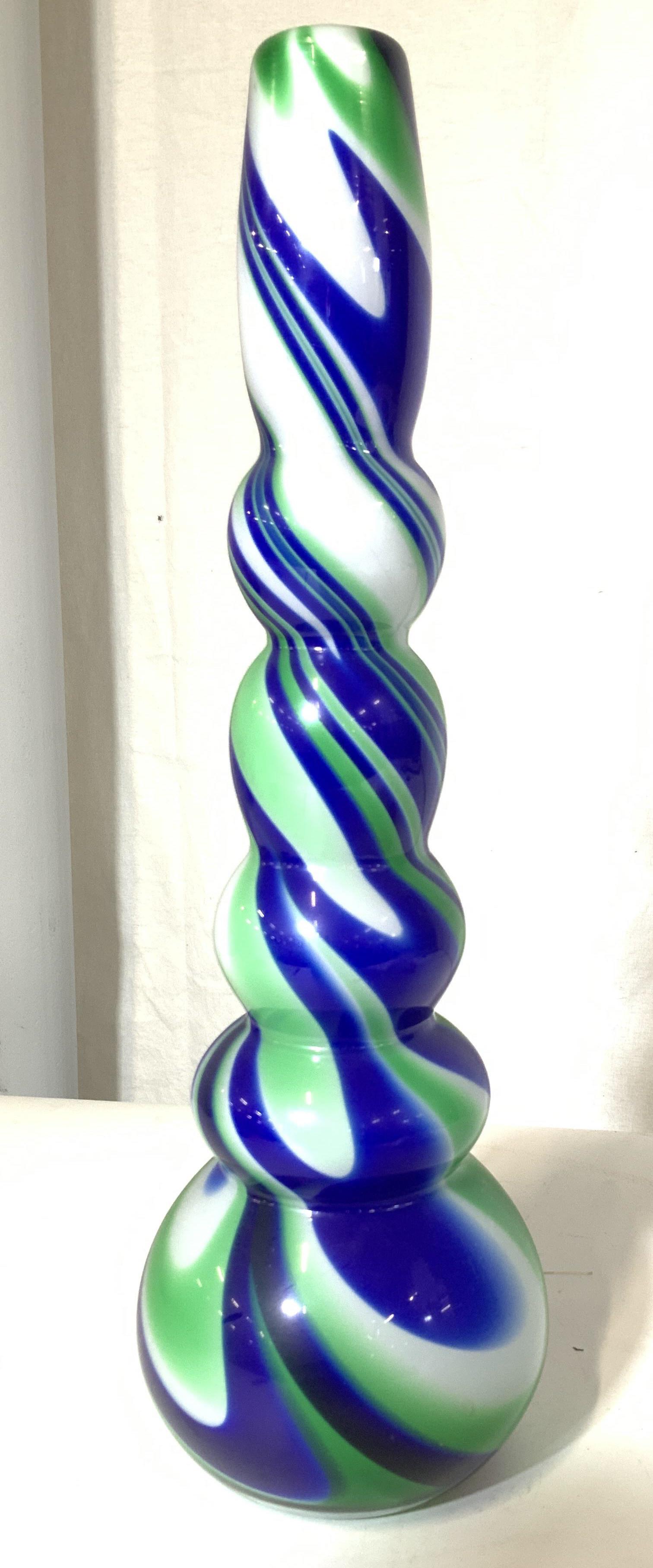 Hand Formed Tall Gourd Art Glass Vessel: Twisted colored glass of a retro decorative hand blown piece. Green, blue and white. Ascending gourd sharp to bottom. Underside pontil. Thick walled and impressive mid century style. 16 in tall, 5.5 i