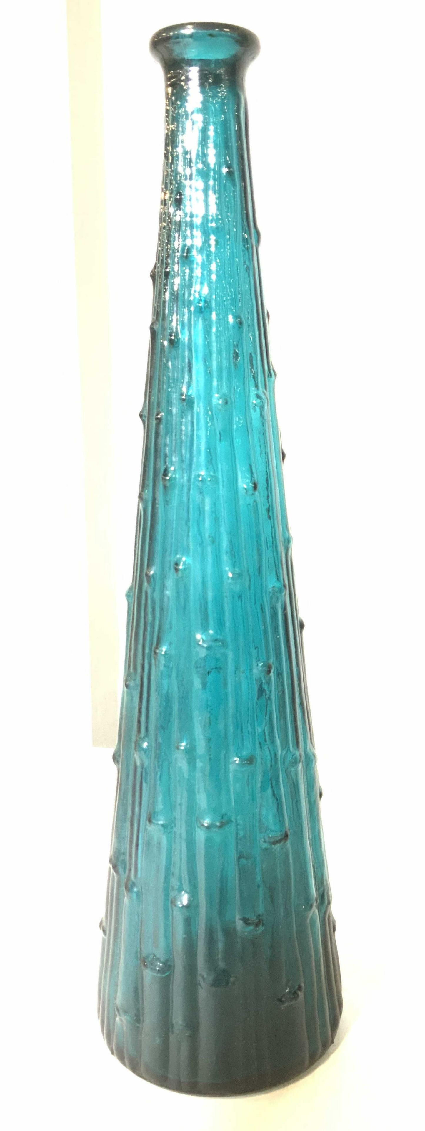 MCM Tall Hob Nob Ribbed Colored Glass Vessel: Teal blue colored glass, retro decorative piece. Slender cone shape. Thick walled and mid century style with color. 15.25 in tall, 4.5 in. at Widest. Property of Multi generation Brooklyn Collector’