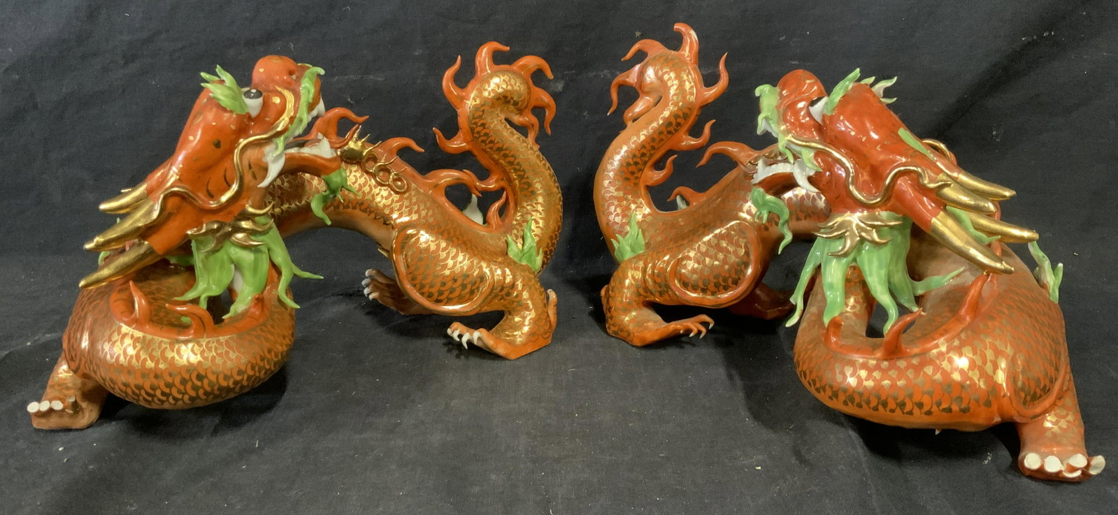 Pair Gilt Porcelain Hand Painted Dragon Statues: Pair Gilt Porcelain Hand Painted Dragon Statues, Chinese stamp in red to underside of piece, label to underside of one reads ‘193’, the two dragon statues are almost exact mirror reflections of on
