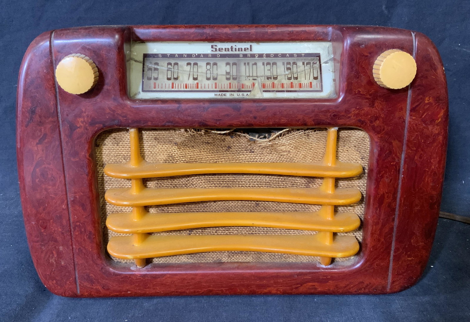 Vintage Sentinel Radio Model 284NR: Vintage Sentinel Radio Model 284NR, body made of plastics (no Bakelite or catalin), glass cracked to front of radio, text to front of radio reads ‘Sentinel, Made in USA’, label to reverse displays