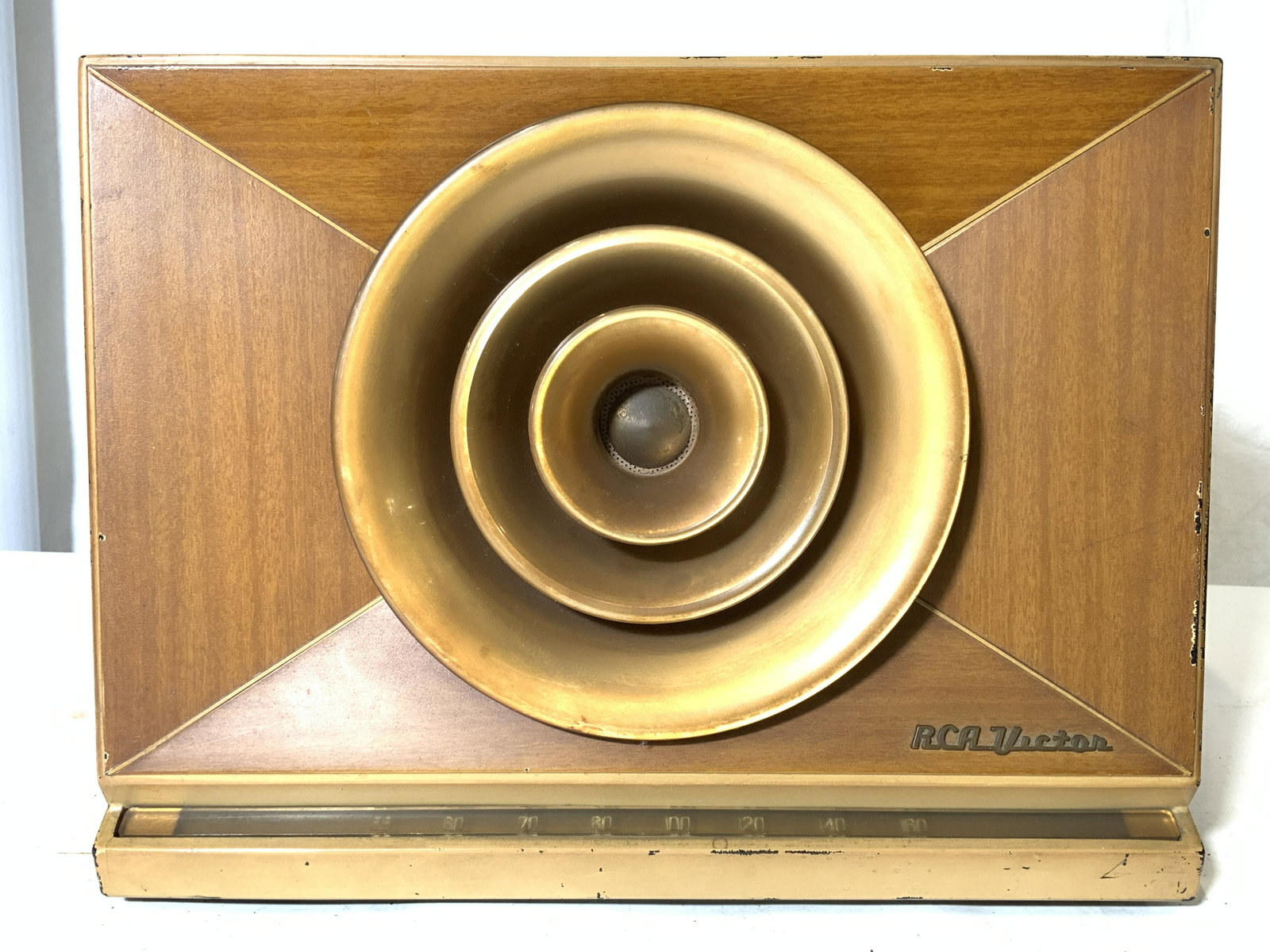 RCA VICTOR 9X572 Vntg Tube Radio: Underside of piece has tag which reads RCA VICTOR 9x572. Right size has 1 knob while left has 2. Made in the USA Circa 1949. Speaker area is gold toned sides are tan. Loudspeaker Permanent Magnet Dyna