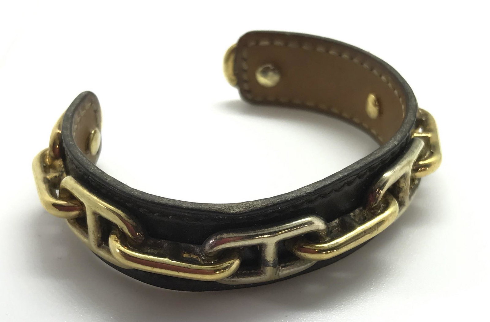 HERMES Paris Vintage signed chain leather Bracelet: High end Vintage French signed HERMES Paris chain link Bracelet. Gold plated chain link bracelet mounted on Leather signed Hermes Paris Made in France on leather back and signed HERMES on chain link. 