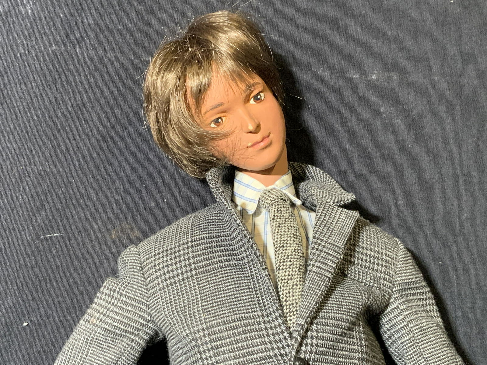 LORD & TAYLOR Window Display Male Puppet: LORD & TAYLOR Window Display Puppet, no apparent inscriptions or marks, a man in a plaid grey suit, measures 21 inches at tallest point, head and appendages need repair at joints, chips and breaks to