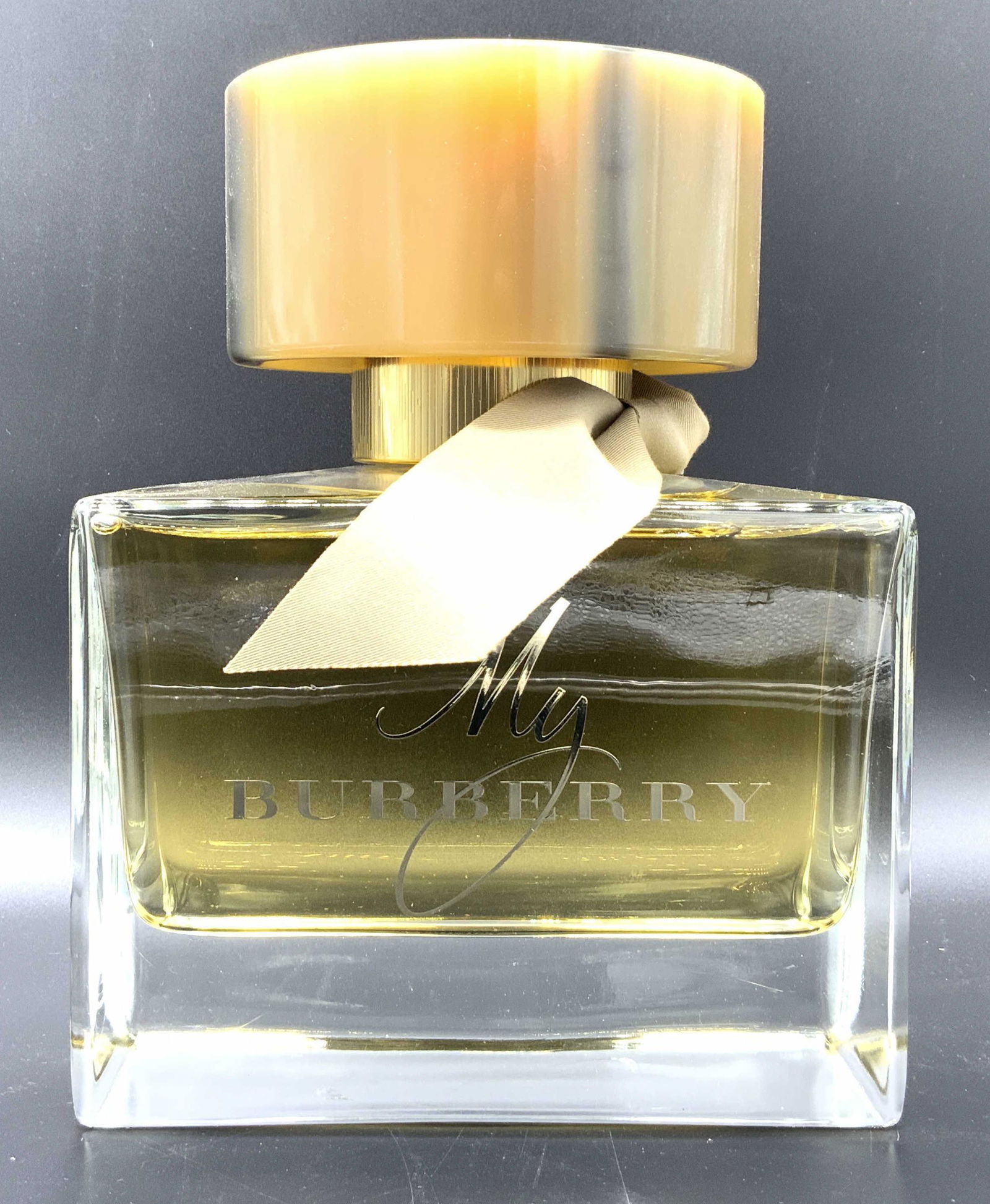 MY BURBERRY Perfume Bottle Oversiz Salesman Sample: Oversized Bottle of the MY BURBERRY , Piece has a brown & beige toned lid, blue glass. These bottles draped the perfume counters of luxury department stores, such as NYC’s Flagship 5th Ave. Lord & T