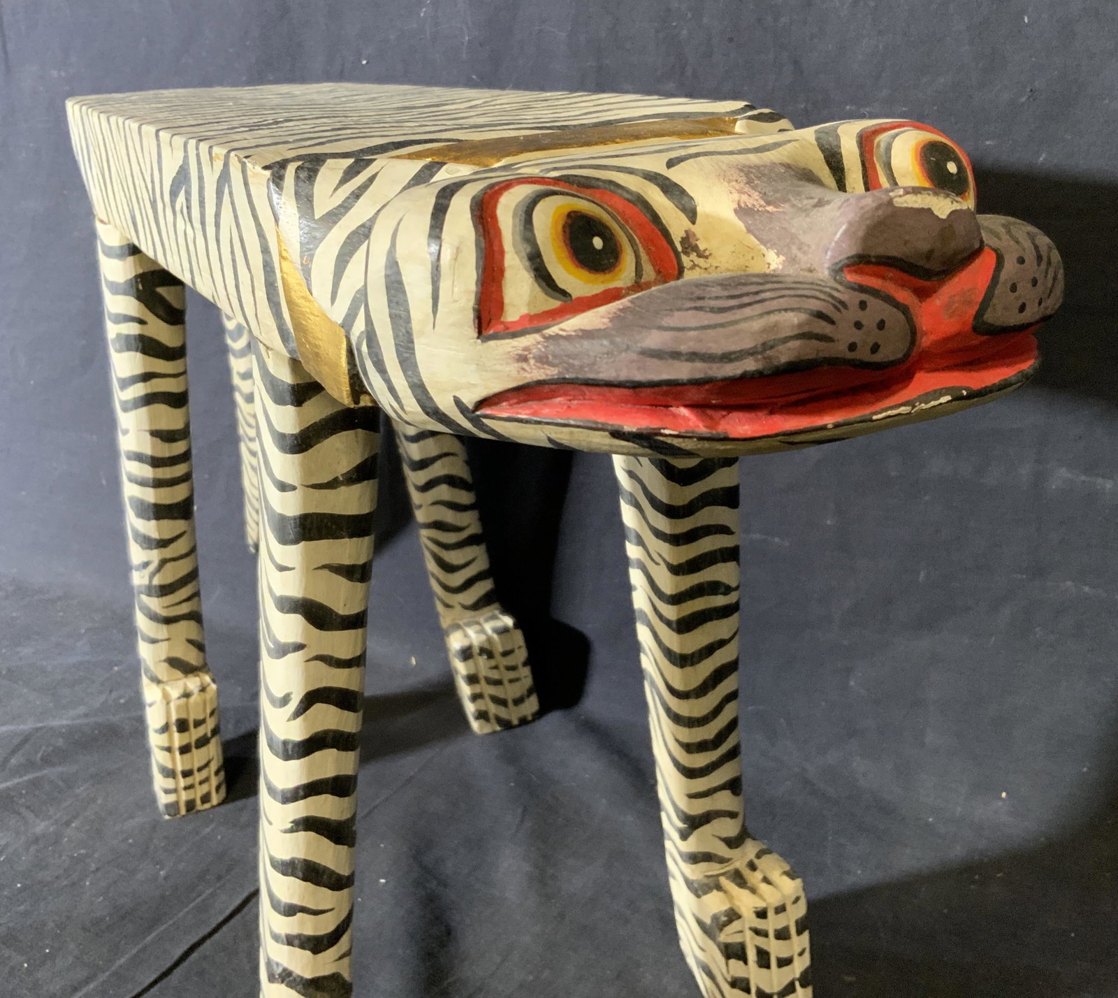 Hand Painted Wooden White Tiger Statue: Hand painted wooden white Tiger statue, no apparent inscriptions or markings, subject a white Tiger carved from wooden with a flat body and squished face, some gilding to piece, some chips and wear fr