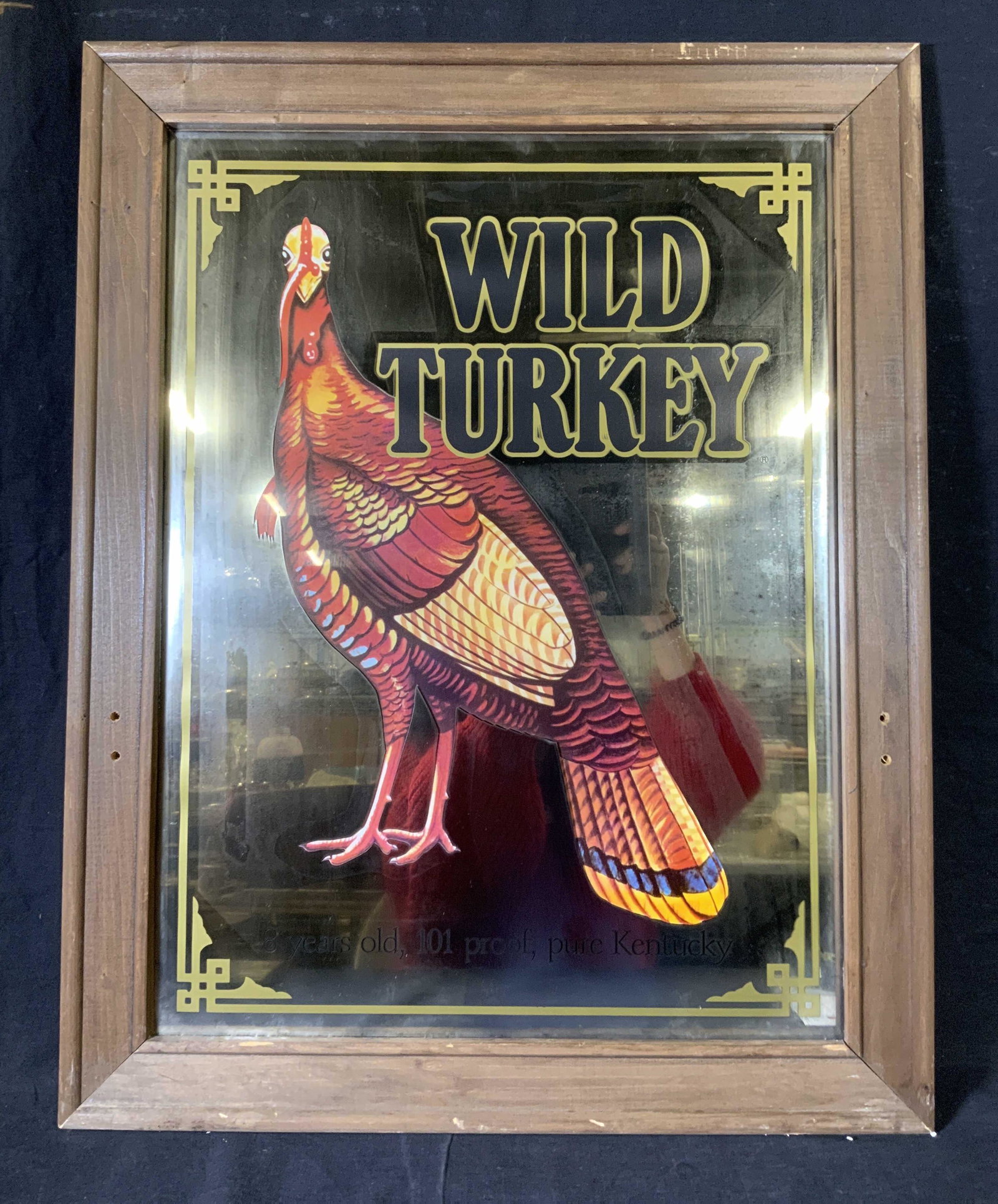 WILD TURKEY Bourbon Bar Mirror: WILD TURKEY Bourbon Bar Mirror, inscription reads ‘Wild Turkey 8 years old’, measures 28 x 22 inches, wooden frame, some surface wear to frame, not examined out of frame, Wild Turkey, bar mirror, 
