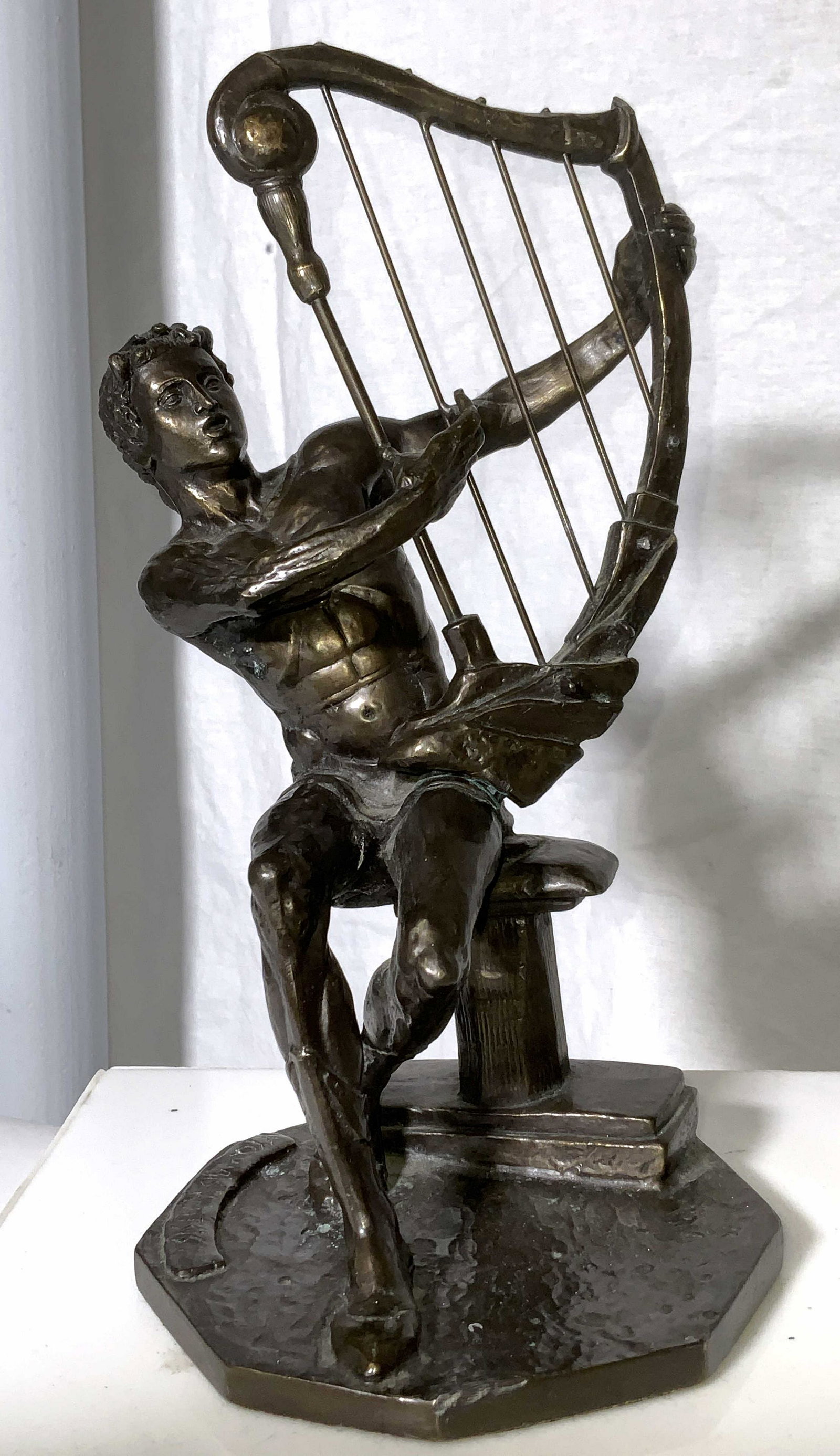 Signed YIANNIS KOUTSIS Bronze Sculpture: Signed bronze sculpture, originally sculpted by YIANNIS KOUTSIS, signed on base, numbered 920. Depicts a male figure playing a harp, possibly king David of Israel. Measures approx 9.75 inches H, and 5