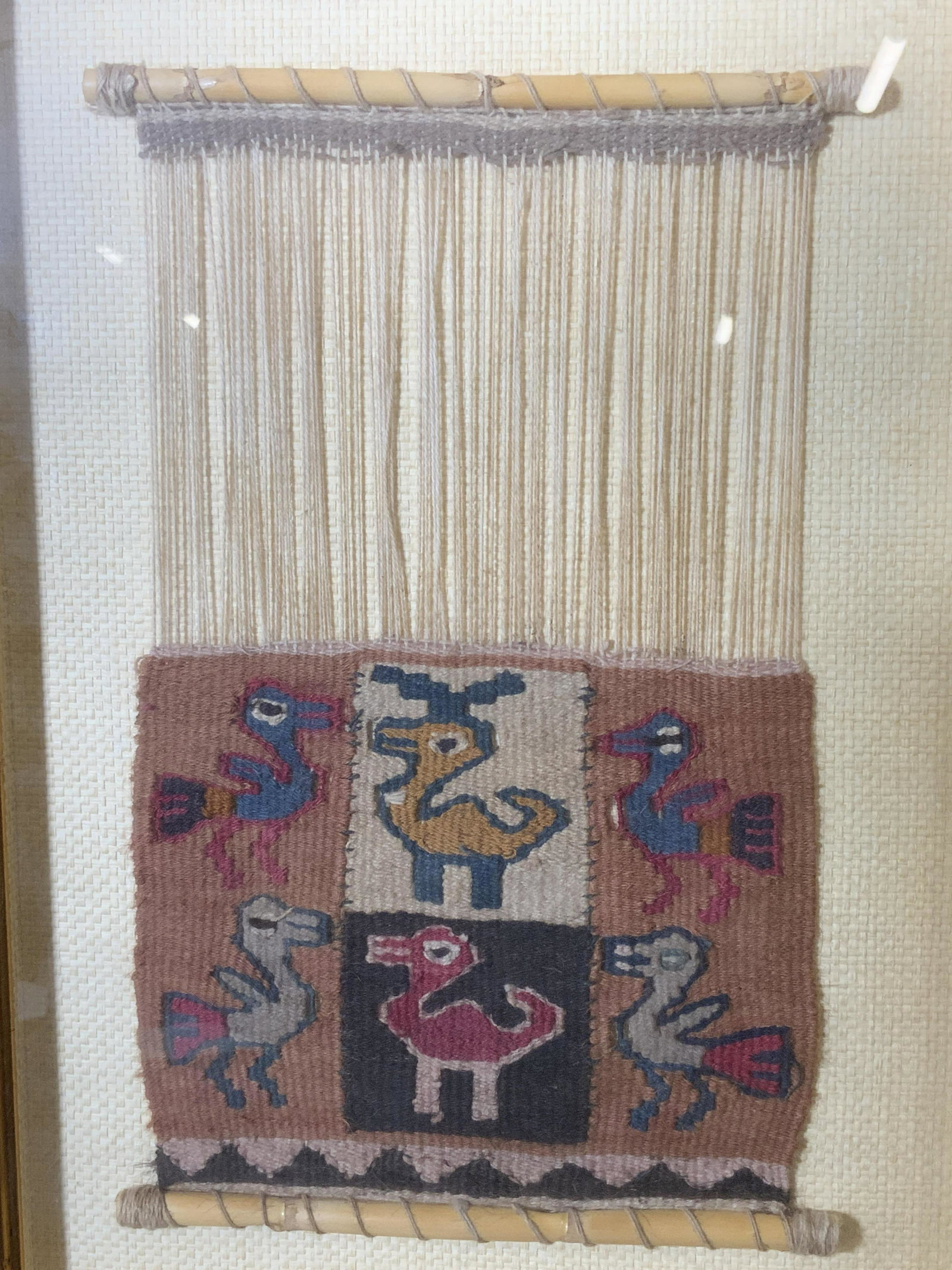 Hand Made Old Egyptian Coptic Tapestry: Hand made old Egyptian Coptic tapestry, no apparent inscriptions or markings, subject a have woven tapestry framed with bird like animal designs, linen matting, wooden frame with gilt accents, piece m