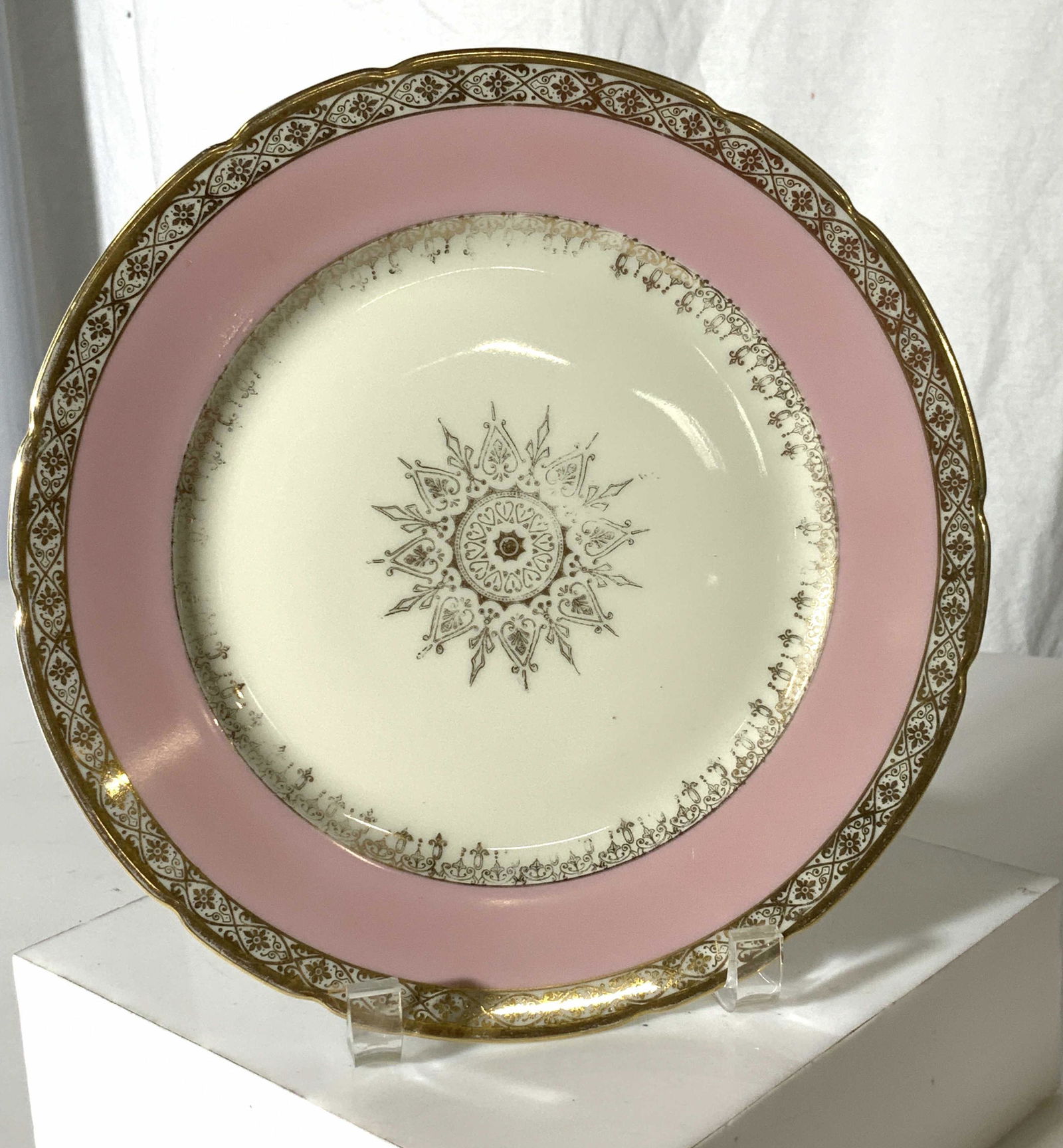 KPM Royal Ivory Porcelain Plate, Germany: Vintage Gilt and pink porcelain Plate, directly from Germany, Hallmarked KPM ROYAL IVORY with royal crown under glaze, stamped 11 . Detailed gilt rim and pink border on cream porcelain, center snowfla