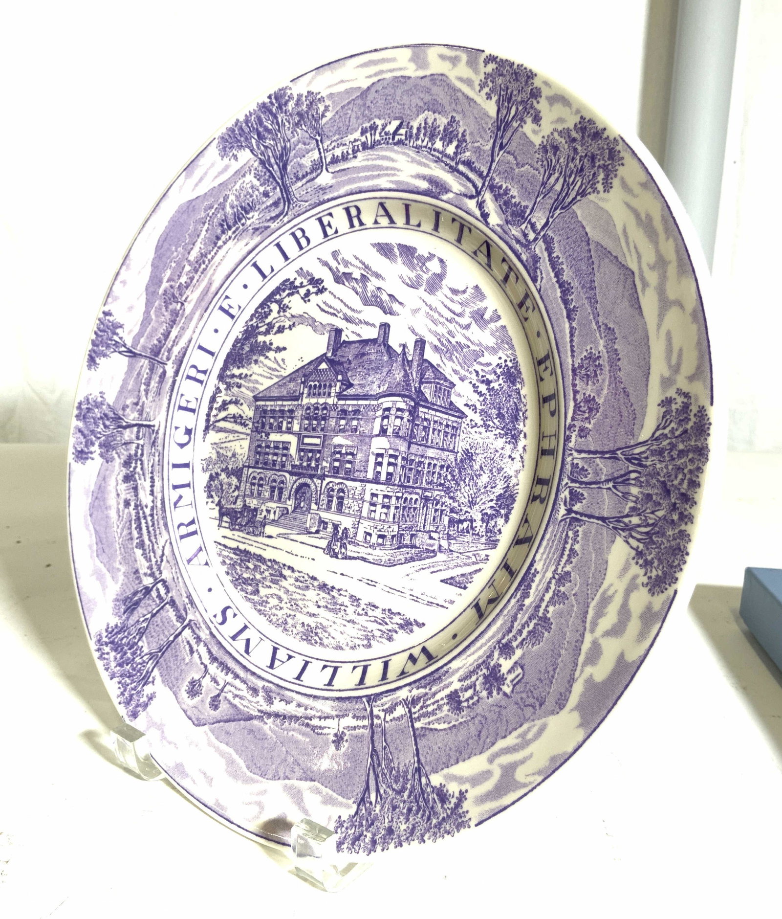 WEDGWOOD Williams College Porcelain Plate & Box: Underside of plate is marked WEDGWOOD EARTHENWARE MADE IN ENGLAND WILLIAMS COLLEGE HOPKINS HALL. Lot includes plate and original box. Plate has printed detail of Hopkins hall architecture in center an