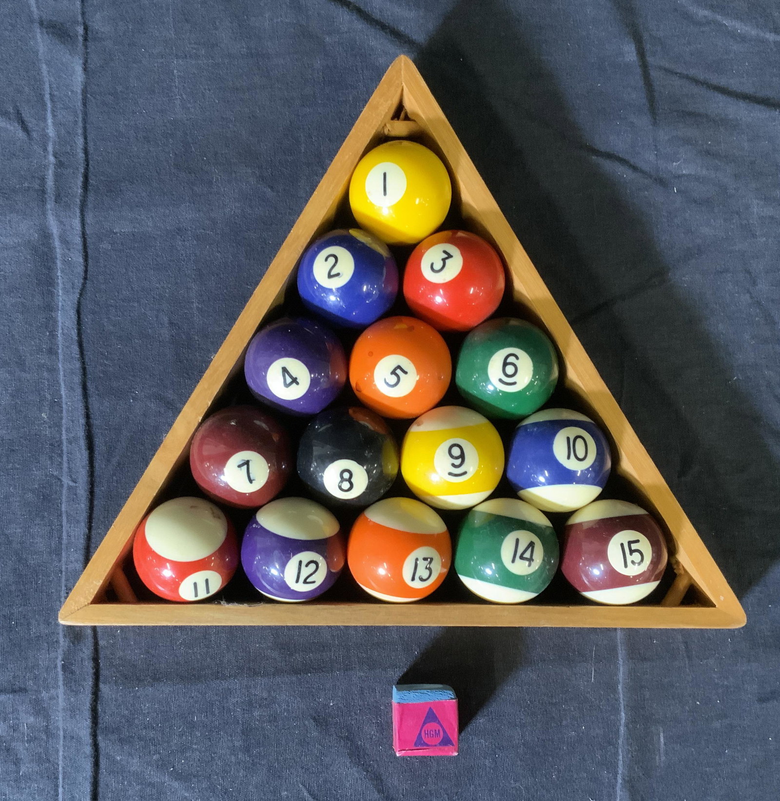 Pool Balls, Rack, and Chalk: Pool Balls, Rack, and Chalk, numerical inscription to pool balls, inscription to chalk reads ‘HGM Superleague Taiwan’, ball rack measures , pool balls measure 1 3/8 inches in diameter, surface wea