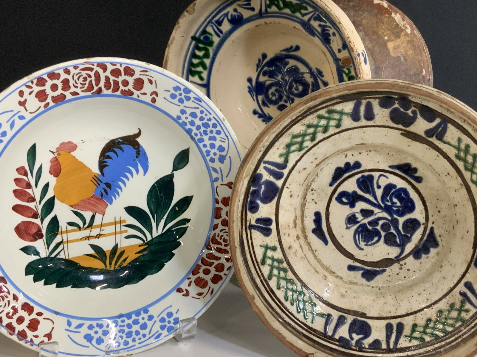 Group 4 Glazed Terra Cotta Wall Pottery, Czech.: Vintage pottery, glazed and hand painted bowls, ready to hang as a decorative set of 3. Tan glaze with blue and green reticulated pattern , each slightly different pattern. 8 1/4 in. diameter , 3 in. 