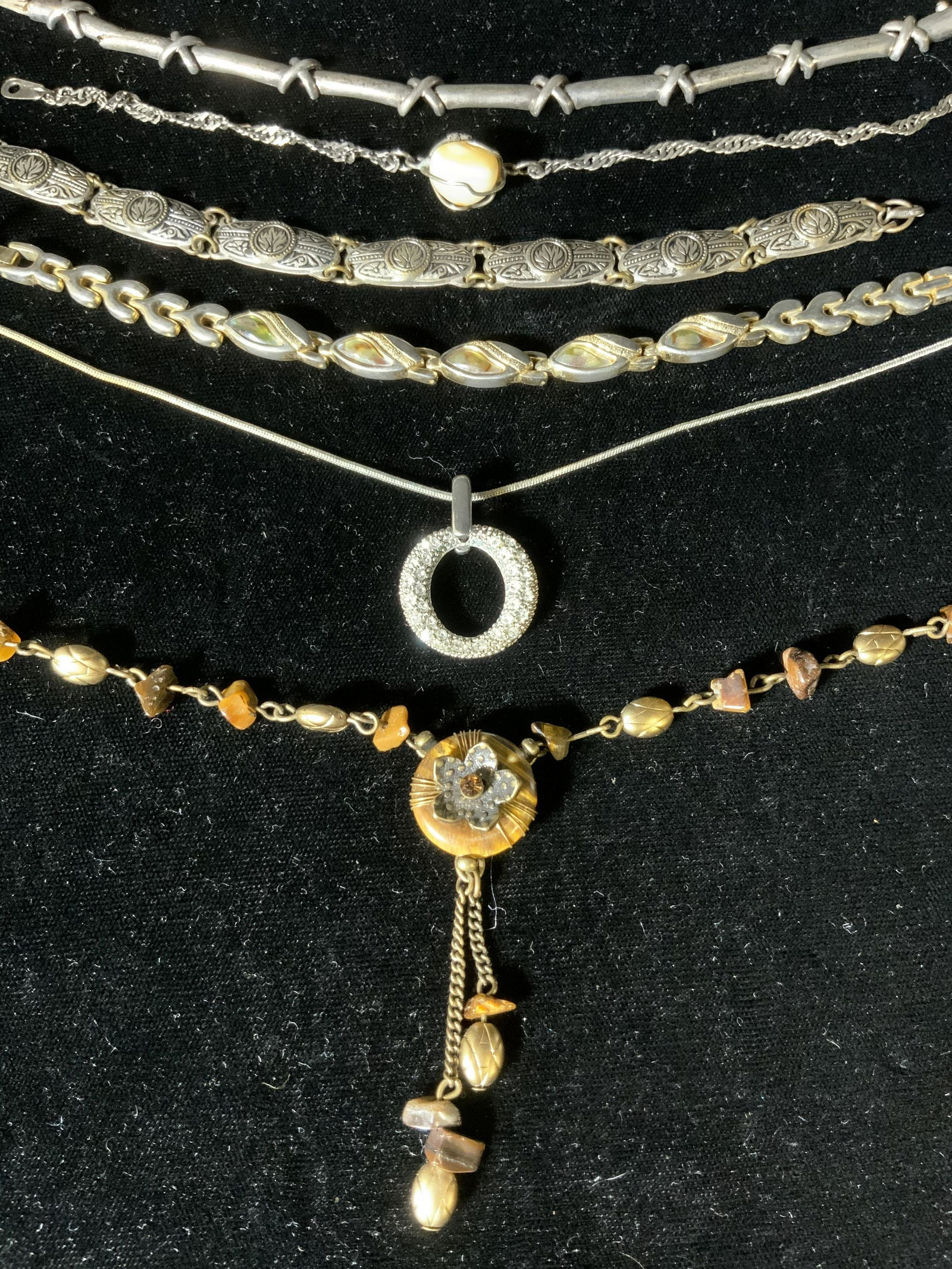 Lot 6 Bracelets & Necklaces, Sterling & More: Lot 6 Bracelets & Necklaces, Sterling & More, inscription to pendant necklace with lobster clasp reads ‘NR’, measures 18 7/8 inches long, inscription to iridescent bracelet with fold over clasp re