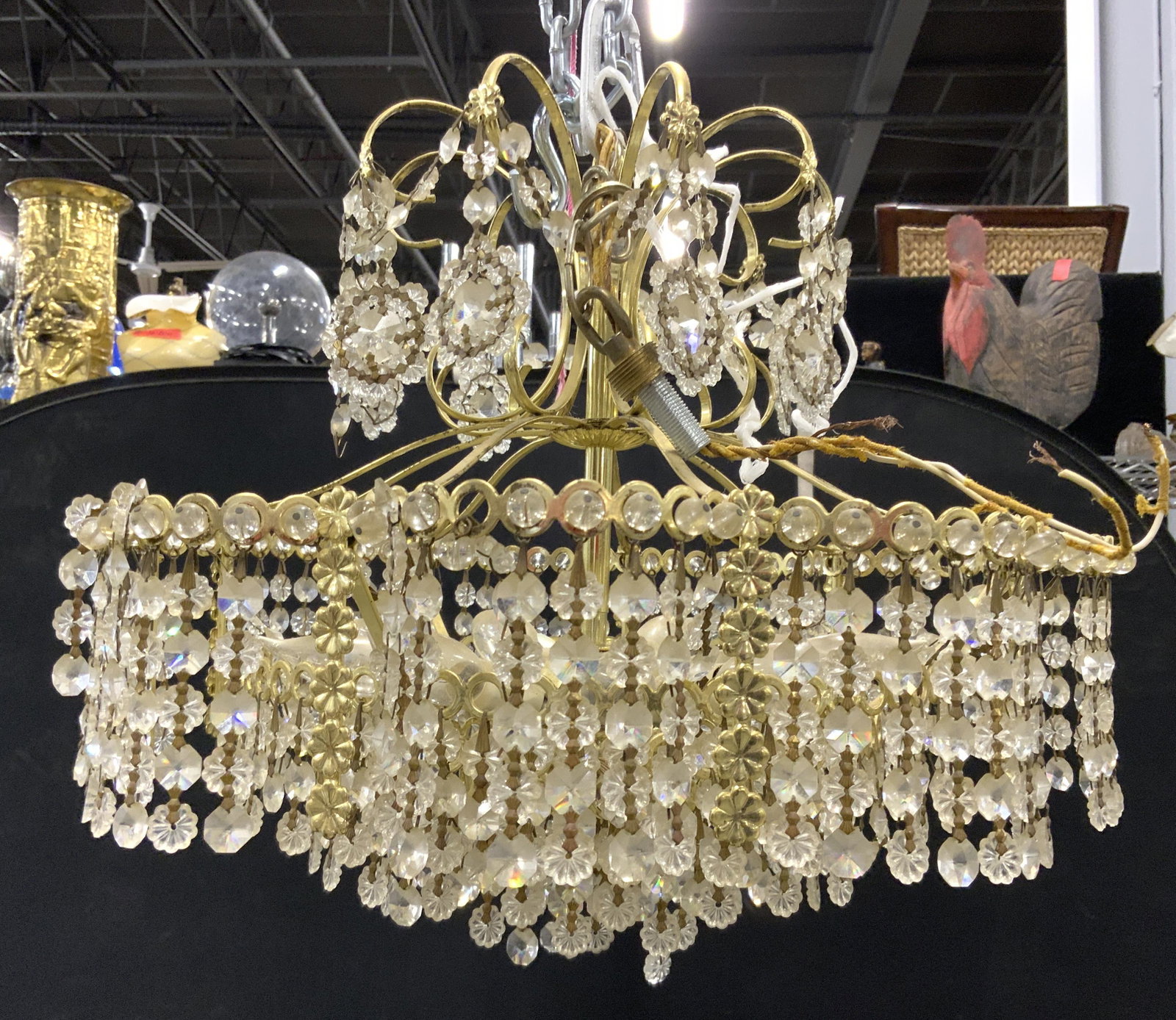 Grand Chandelier With Hanging Prisms: Grand Chandelier With Hanging Prisms. Not tested for working condition. Measures approx 17 inches wide 12 inches tall. chandelier, light fixture hanging light, home lighting, home accent, 6