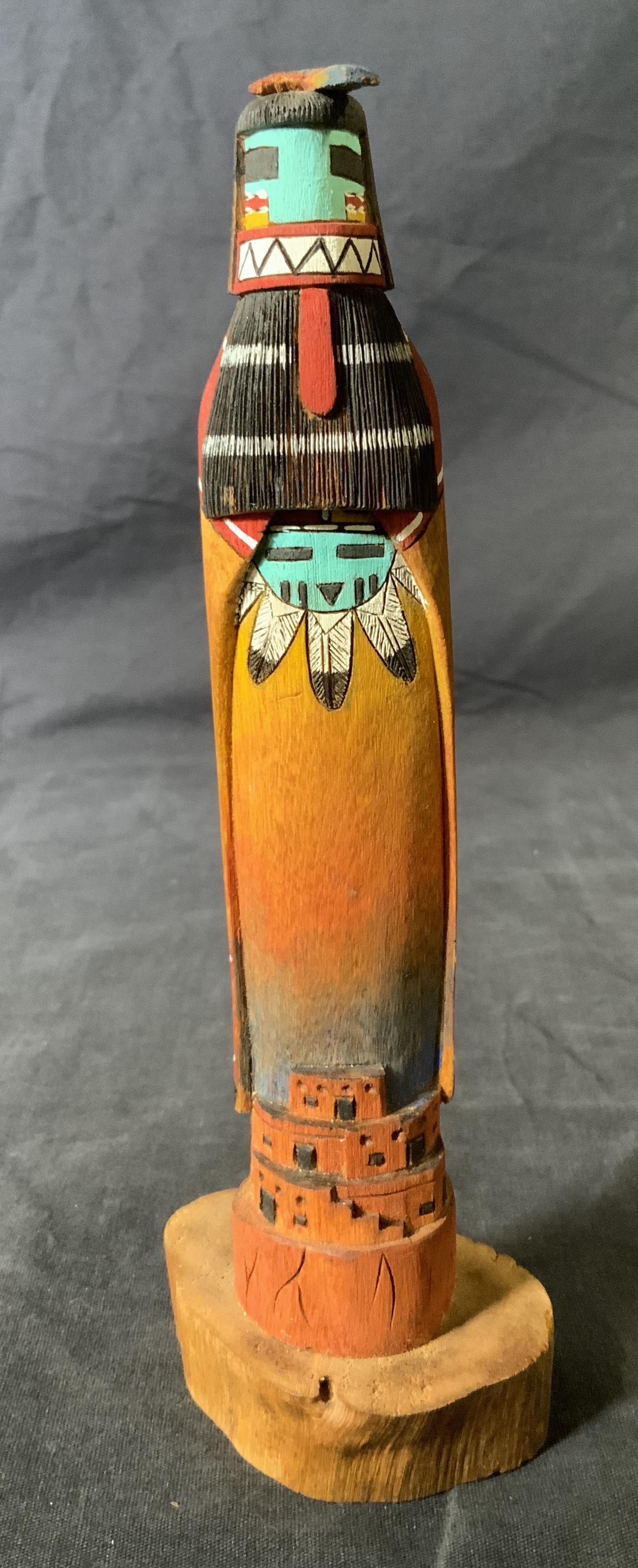 ROBERT HARRIS Signed Hopi Kachina Sculpture: ROBERT HARRIS Signed Hopi Kachina Sculpture, inscription to base reads ‘Robert Harris Jr Warrior Maiden Hopi’, measures 8 1/2 inches tall x 2 7/8 inches wide at base, loss to figure’s feathered