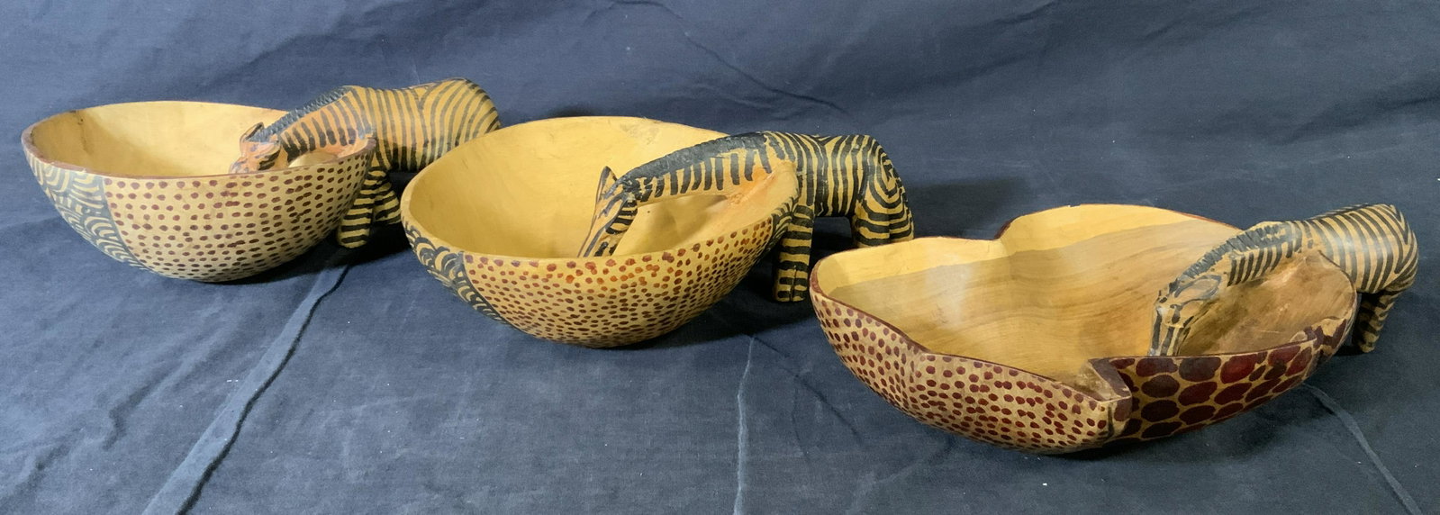 Set 3 Hand Carved Kenyan Zebra Bowls: Set 3 Hand Carved Kenyan Zebra Bowls, label to base of one bowl reads ‘Hand Crafted Made in Kenya’, smallest bowl measures 2 7/8 inches tall x 9 1/2 inches at widest point, second largest bowl mea
