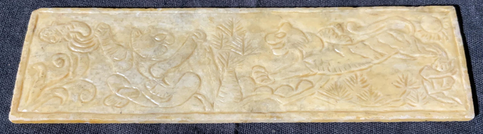 Hand Carved Stone Tablet: Hand Carved Stone Tablet, no apparent inscriptions or signatures, subject a dual sided tablet with carvings depicting tigers in a jungle scene, piece measures 5 inches by 1.5 inches, Hand carved, carv