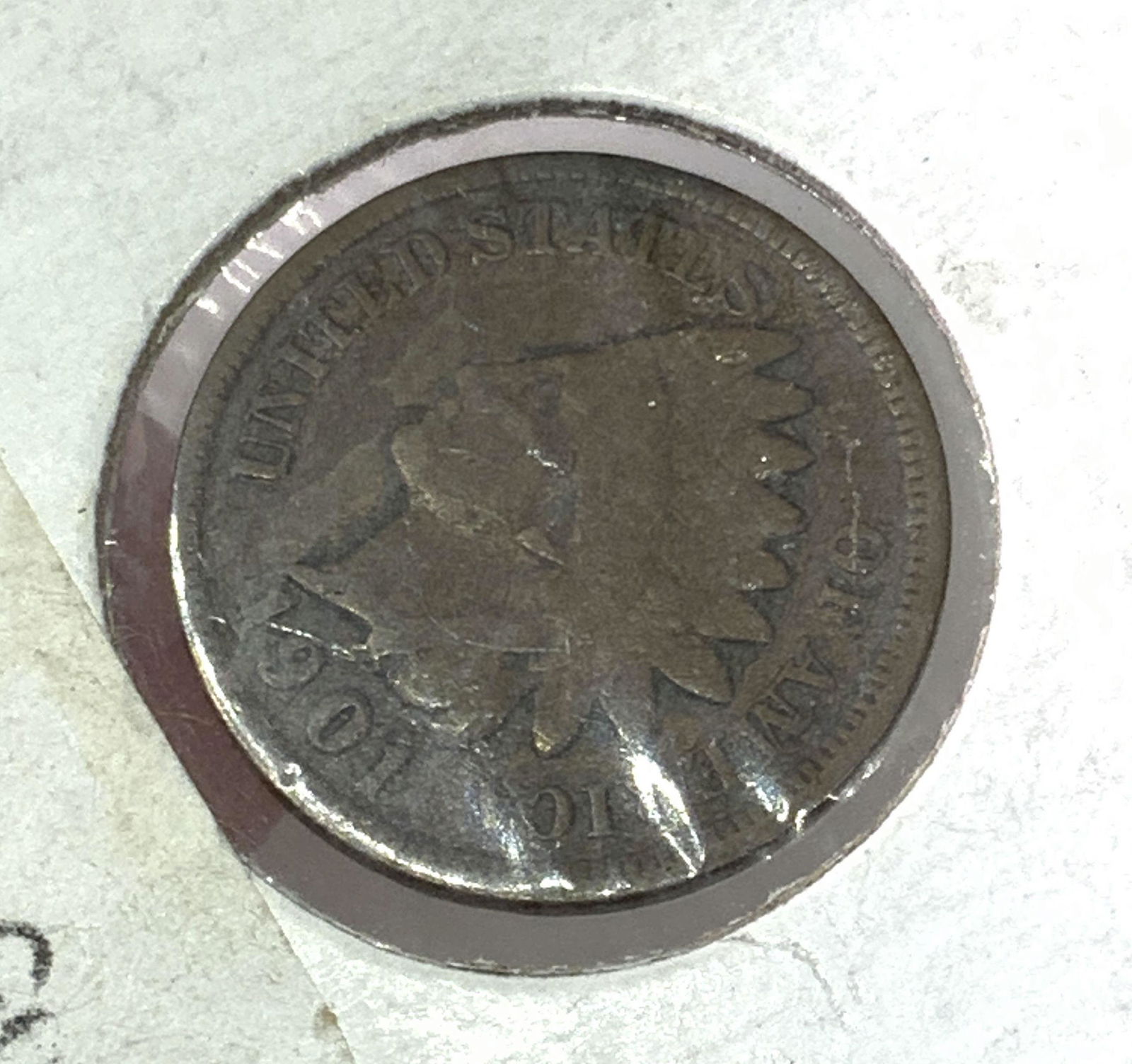 Antq Collectible Currency, 1901 Indian Head Penny: A collectible 1901 antique Indian Head penny. Penny obverse depicts a Native American wearing a headdress. Text reads: UNITED STATES OF AMERICA, 1901. Reverse reads: ONE CENT. Penny is sealed in a cas