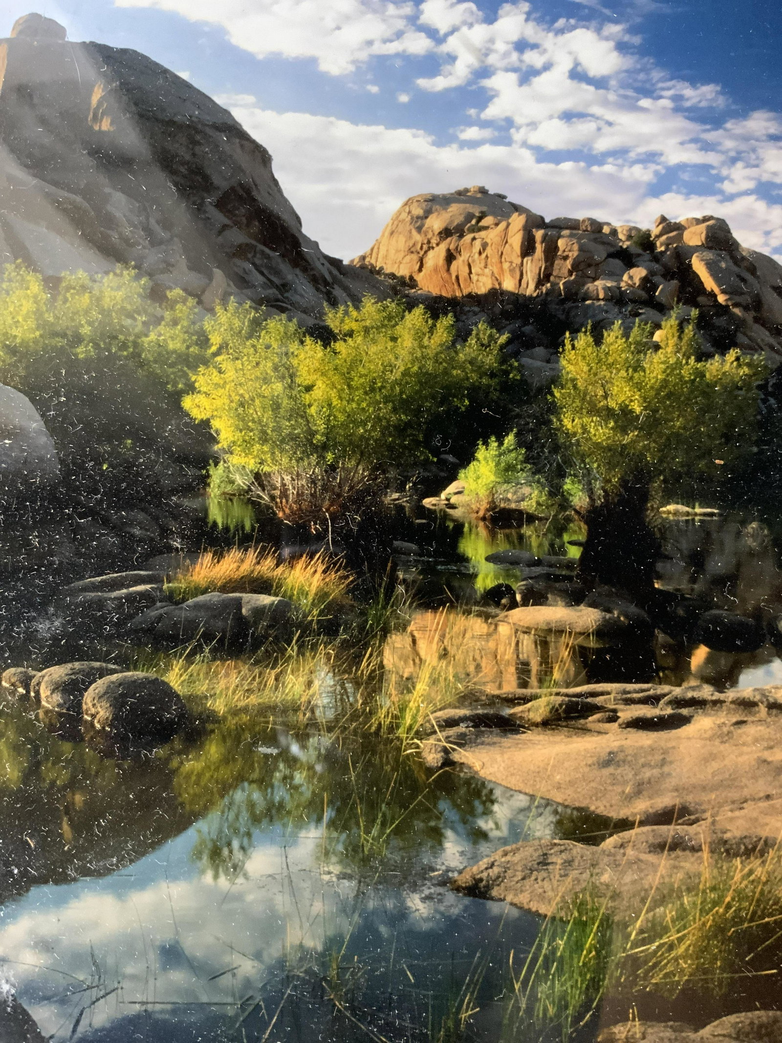 KIRK H OWENS Signed Photograph of Barker Dam: KIRK H OWENS Signed Photograph of Barker Dam, signature to lower right reads ‘Kirk H Owens’, subject a mountainous landscape and body of water, measures 10 5/8 x 8 3/8 inches, black metal frame, s