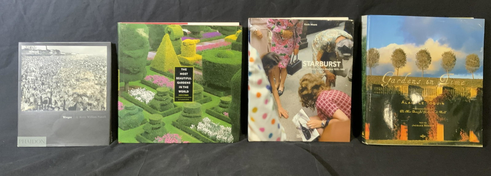 Group 4 Coffee Table Books: Group 4 coffee table books, titles include ‘Weegee by Kerry William Purcell’ ‘The Most Beautiful Gardens in the World by Alain Le Toquin’ ‘Starburst by Kevin Moore’ and ‘Gardens in Time 