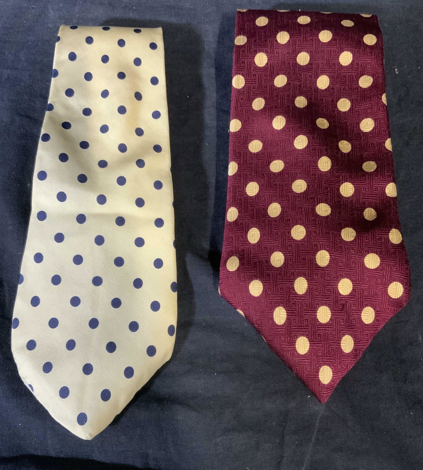 Group Lot Silk Polka Dot Ties: Group Lot silk polka dot ties, labels to interior read ‘Andrew Scott Handmade 100% Silk’ and ‘Tommy Hilfiger’ ‘Made in USA All silk of imported fabric’, tie designs are red with yellow spo