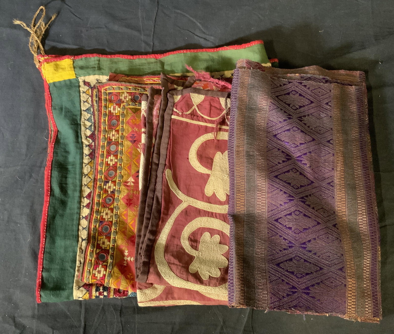 Lot 4 Embroidered Textiles & Table Runner: Lot 4 Embroidered Textiles & Table Runner, no apparent inscriptions or labels, table runner measures approximately 66 1/2 inches long x 14 inches, green and red textile measures 29 x 31 inches, red an