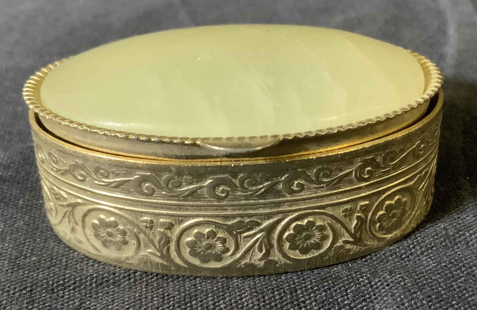 Pill Box with Green Stone: Pill Box with Green Stone, no apparent inscriptions or marks, measures 3/4 inch tall x 1 7/8 inches at widest point, some surface wear from use, loss to removable component to interior, Pill box, trin