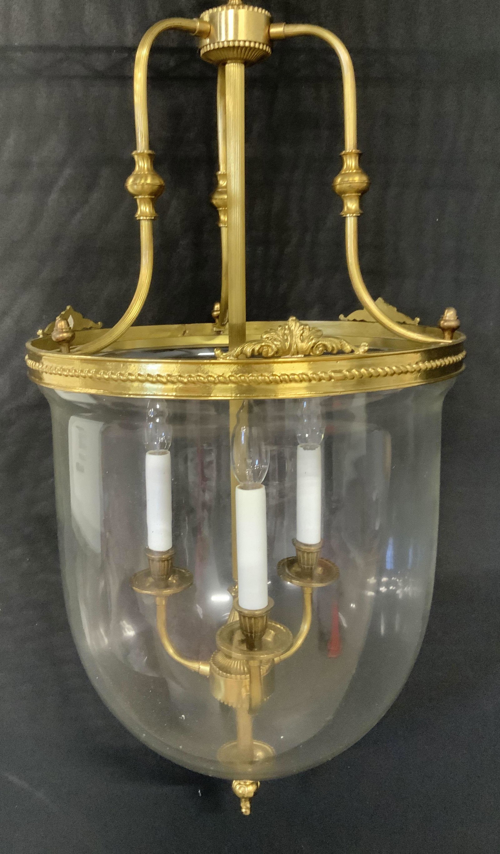Grand 3 Light Brass, Bronze & Glass Ceiling Light: Dome glass light with Victorian pontil, 3 chandelier lights set on gilt brass toned bronze, arms inside dome. Connected to decorative brass ceiling chain, simple ceiling plate with screws for fixture.
