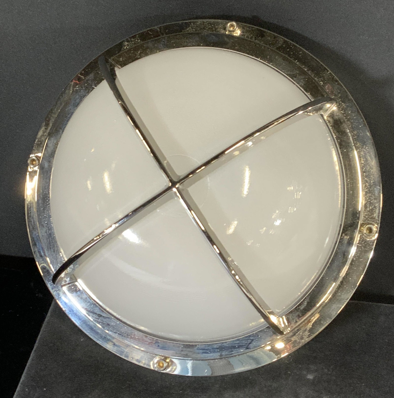 Nautical Caged Chrome Ceiling Ship Light: Modern style nautical light, , can be used on ceiling or wall, frosted glass with rounded dome shaped shade, caged inside chrome. App 10 in. Diameter. Depth app 5 in. Heavyweight. Backside with wiring