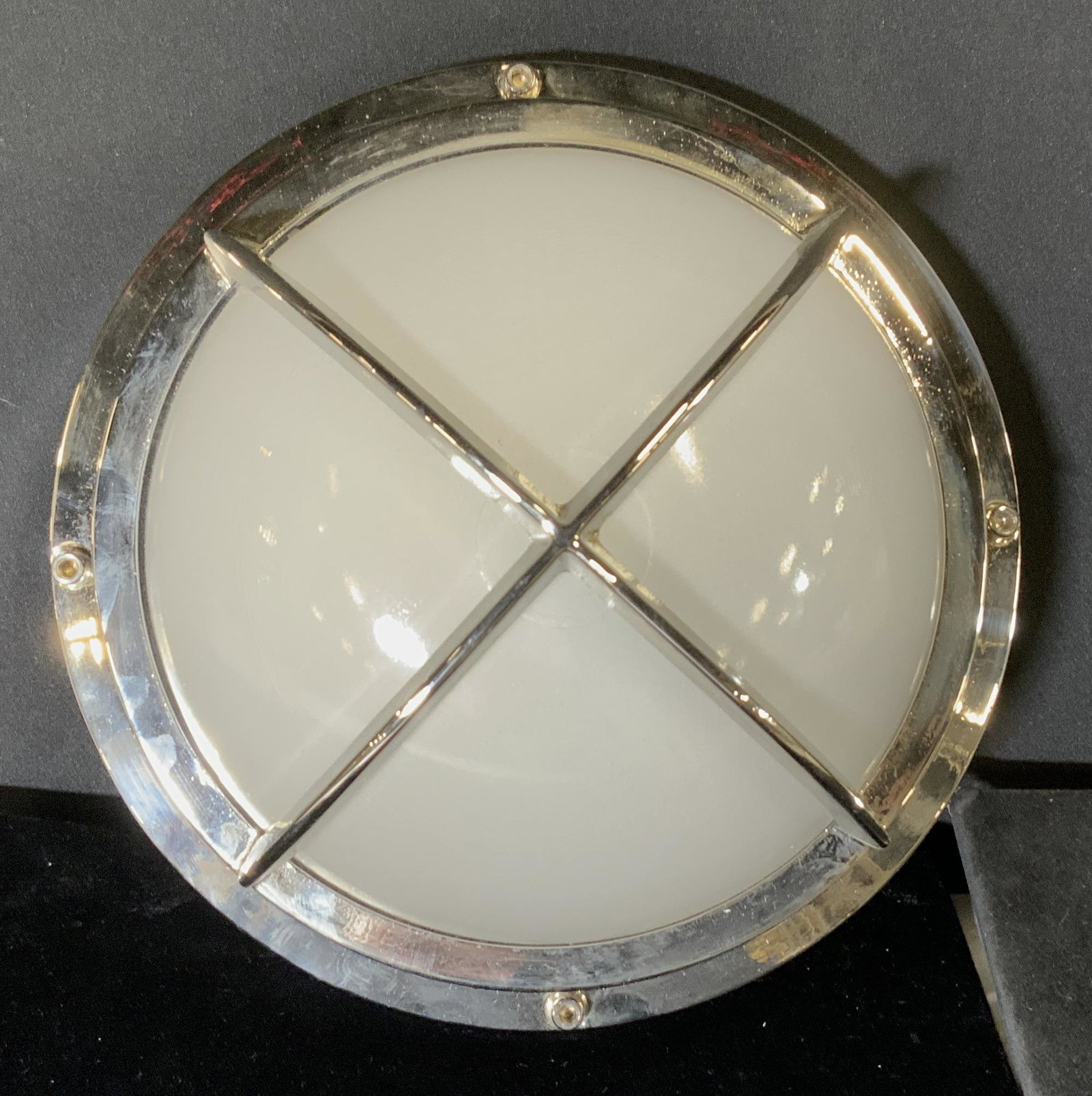 Nautical Caged Chrome Ceiling/HallwayShip Light: Modern style nautical light, , can be used on ceiling or wall, frosted glass with rounded dome shaped shade, caged inside chrome. App 10 in. Diameter. Depth app 5 in. Heavyweight. Backside with wiring