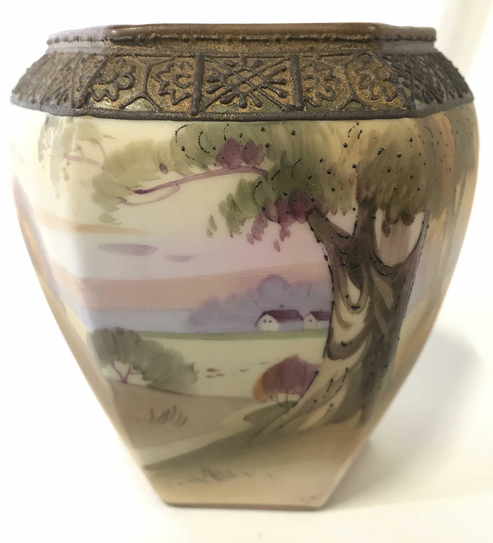 NIPPON Hand Painted Vintage Porcelain Vase: Underside of vase is marked NIPPON HAND PAINTED. vase is porcelain. Piece has hand painted detail depicting landscape scene. Vase measures approximately 5 inches tall, and wide. Vase, porcelainware, p