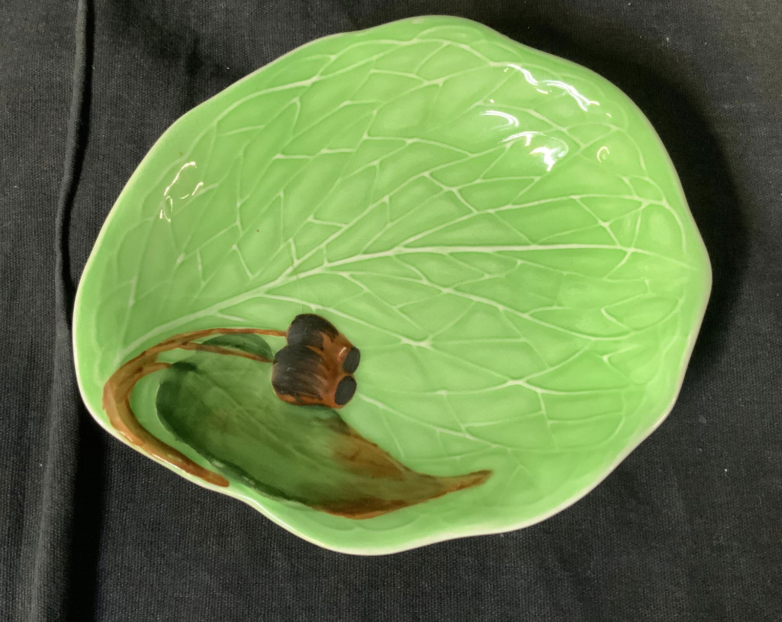 CARLTON WARE Leaf Shaped Majolica Dish, England: Carlton Ware Leaf Shaped Dish, stamp to base reads ‘Carltonware Made in England Trademark Australian Design Application No 10805 Ro No 789942’, has flower and leaf design, measures 5 1/4 x 4 3/8 i