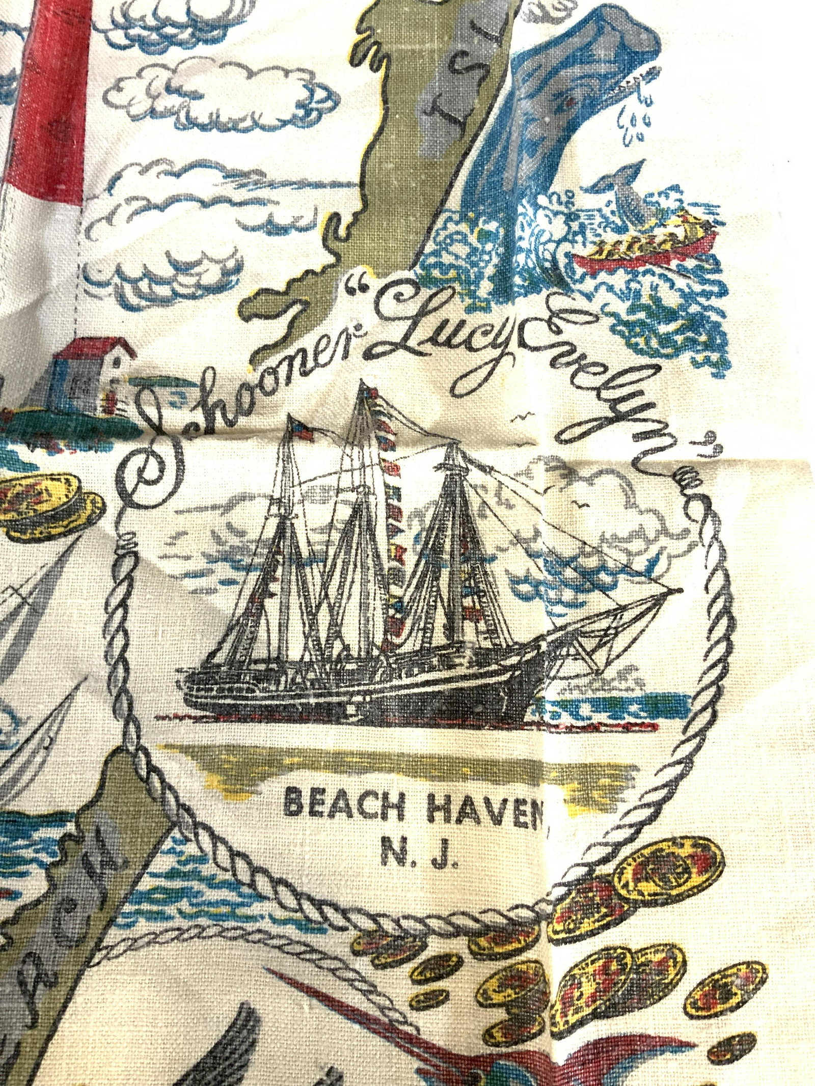 Collectible Linen Maritime Tea Towel, signed: A copyrighted designed by Artist Paris Berube of The Schooner Lucy Evelyn, Lighthouse and scenery from Beach Haven, NJ. Appears never used. 29.5 x 16 in. Great for kitchen, barbecue, more. Collectible