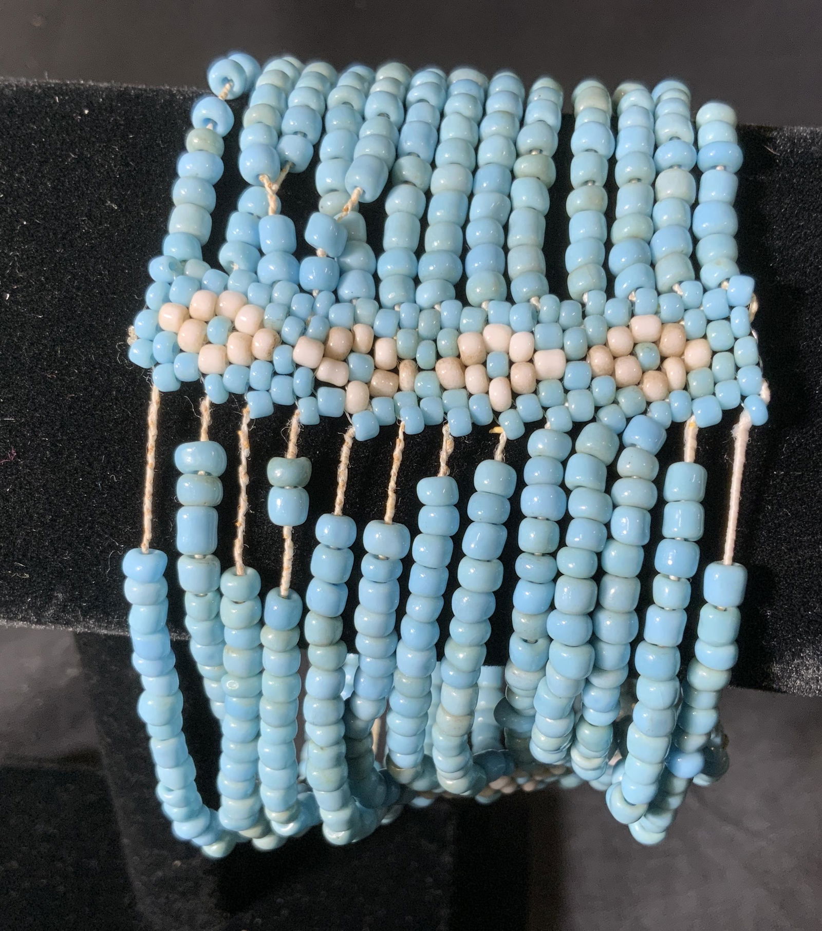 Lot 2 Blue Seed Beaded Bracelets, Jewelry: Lot 2 Blue Beaded Bracelets, no apparent inscriptions or marks, single strand bracelet measures 3 inches in diameter, multi strand measure 2 3/8 inches wide x approximately 2 1/2 inches in diameter, c