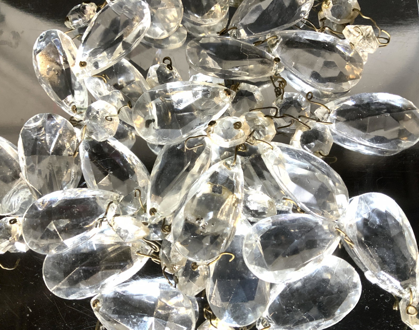 Lot Chandelier Lamp Lighting Prism Drops: Chandelier accessories, pressed glass prism teardrops. Some are the octagonal prisms. 15 mm and 40 mm L. Property of multi generation Brooklyn Collector’s Estate. Crystal chandelier prism accessorie