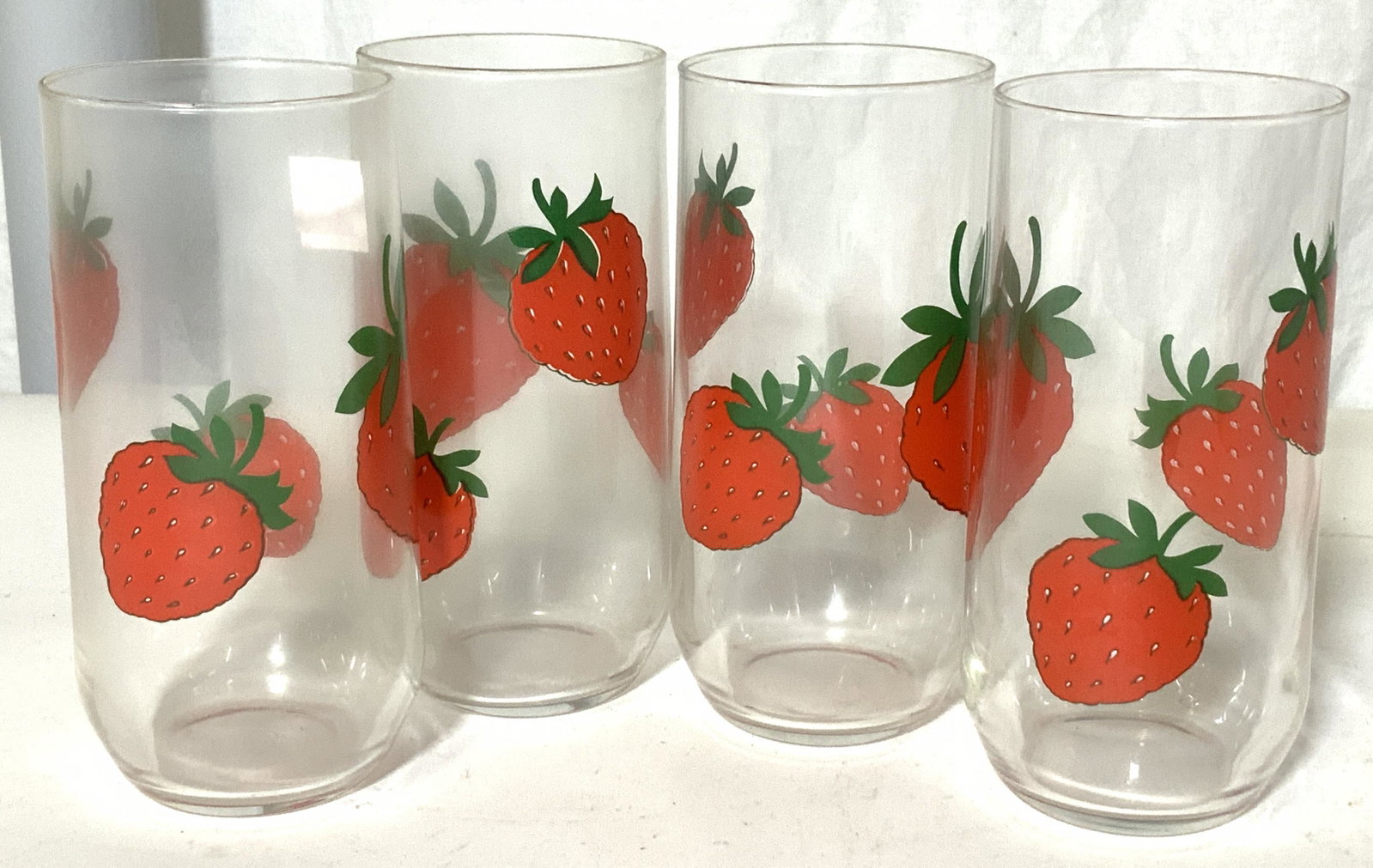 Vintage Tumbler Water Glasses w Strawberry Motif: Set 4. Vintage Juice/ water/ soda glasses with stencil strawberries on glass. 5.75 in ht, 3 in. W Property of Multi Generation Brooklyn Collector’s Estate. Barista, kitchenware, vintage juice glasse