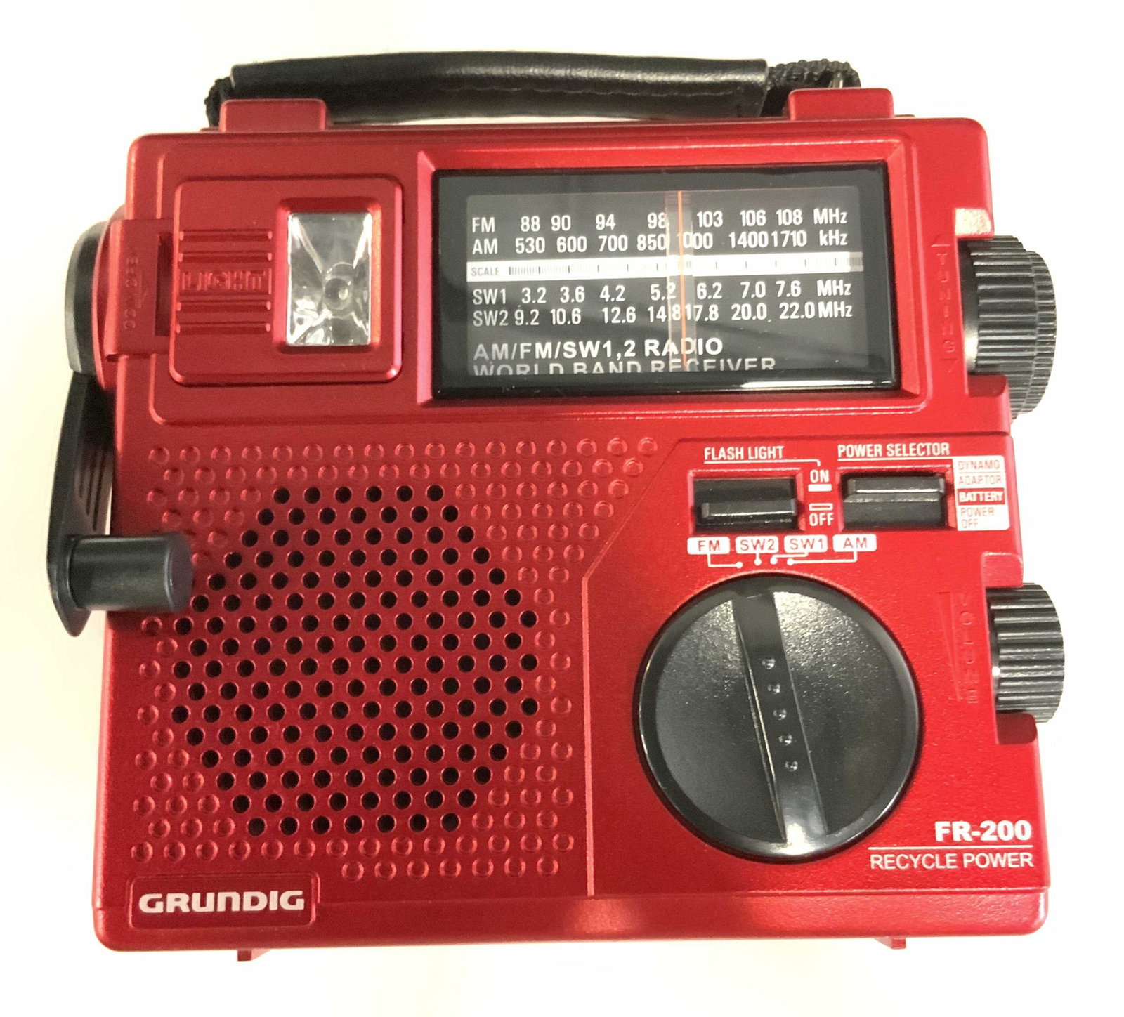 Collect GRUNDIG EMERGENCY RADIO Fr200 W/ Box: A collectible red Grundig Fr200 red radio that comes with its original box. Date they first became available is 2002. This is an emergency crank radio. Can also run on batteries. The piece comes with 