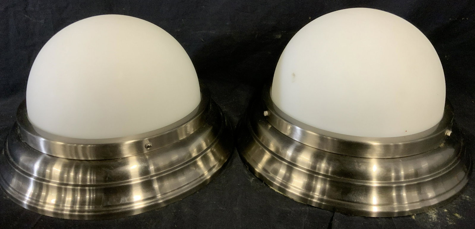 Pair Dome Ceiling/ Wall Lights: Pair dome ceiling/wall lights, no apparent inscriptions or markings, underside of lighting units has insulation and wiring, needs to be electrified, glass to lighting is frosted, has steel toned metal