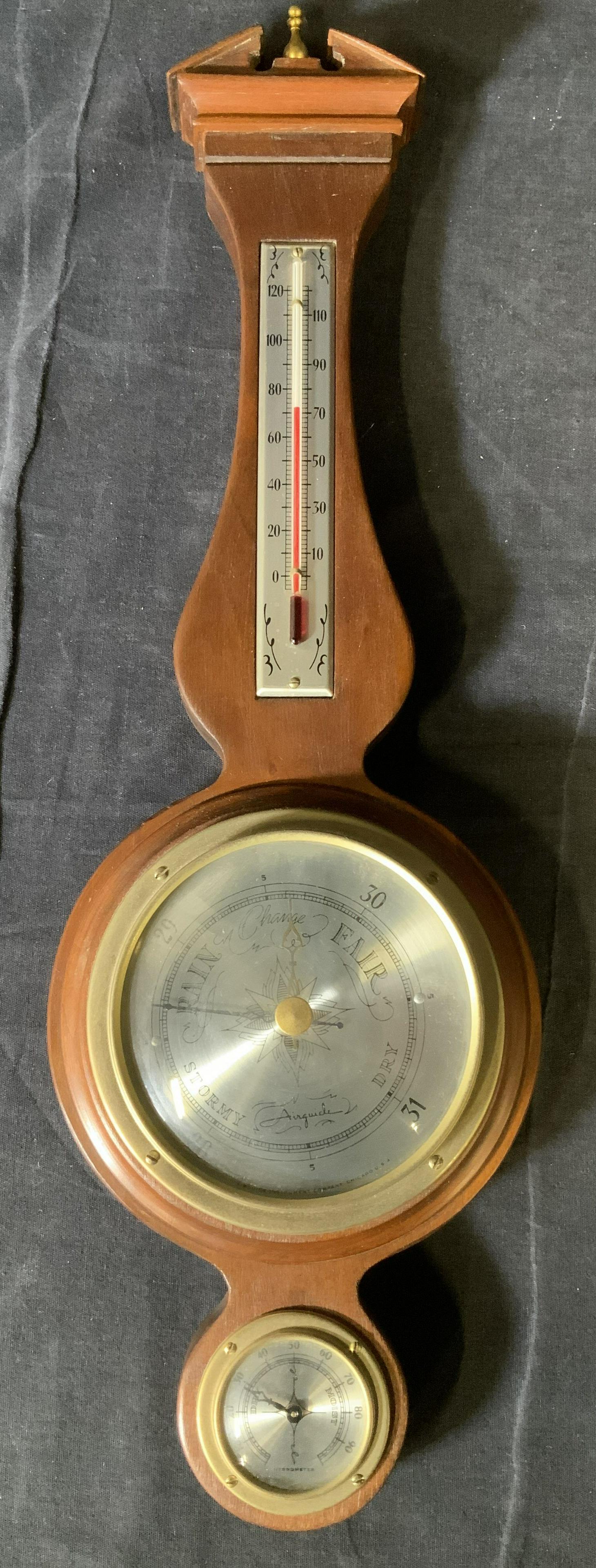 Vintage AIRGUIDE Barometer: Vintage AIRGUIDE Barometer, inscription reads ‘AIRGUIDE Instrument Company Chicago USA’, measures 20 3/8 x 6 1/4 inches at widest point, some surface wear to piece, not tested for functionality, P