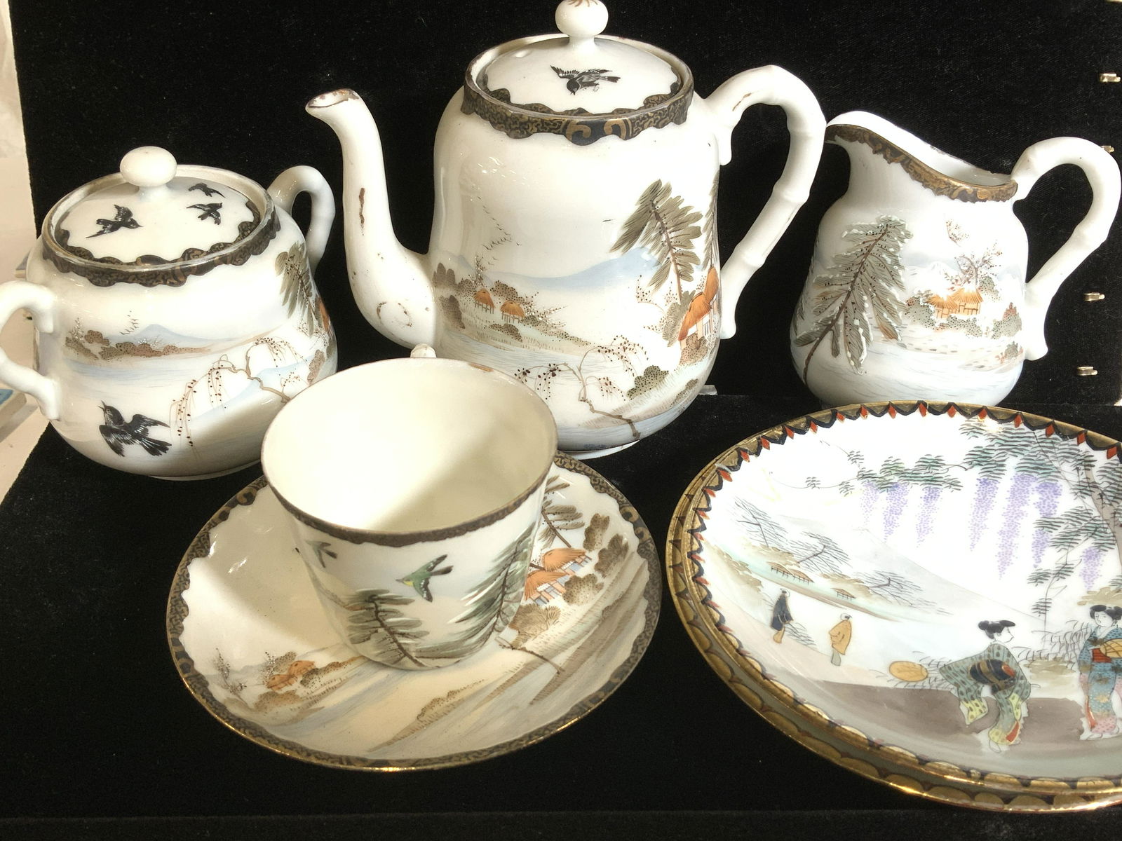 Fine Bone China Tea Set for 1, Hallmarked -Japan: Lovely Japanese fine bone China set for 1, includes teapot with steam hole, lidded sugar bowl, creamer, demitasse tea cup with saucer. Additional 2 dessert plates ( glaze craze or repaired crack). Tea