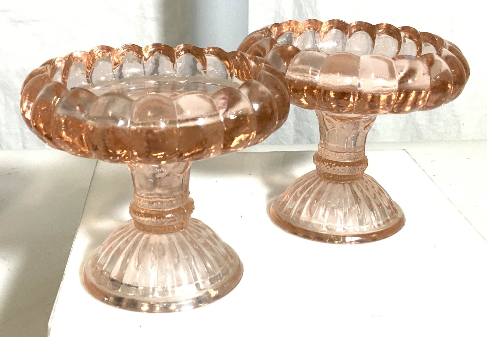 Lot 3 PINK DEPRESSION GLASS Candle Holders, more: Pair of thick walled depression glass pedestal candle holderS with scalloped rim and embossed base. Measure 3.5 in. Ht, diameter 3 in. for candle, total width 4.25 in. Additional furled etched pink de