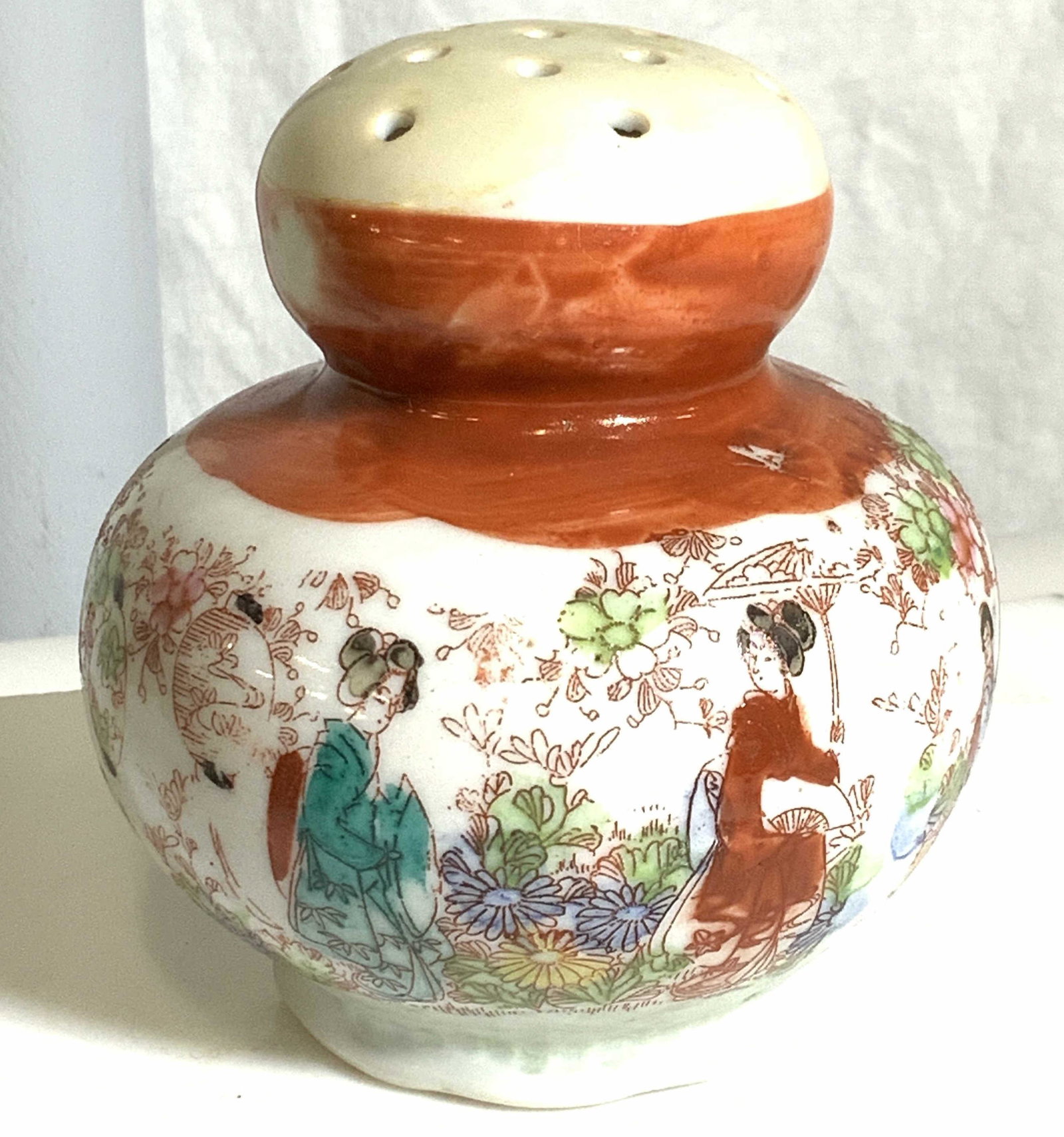 Japanese Porcelain Spice Shaker w/ cork plug: Hand painted shaker, fine bone porcelain , intricate illustrative detail of daily life. Japanese women dressed in traditional clothing. No Mark on verso, 4 in ht, 4 in. W. Other Matching/ Similar item