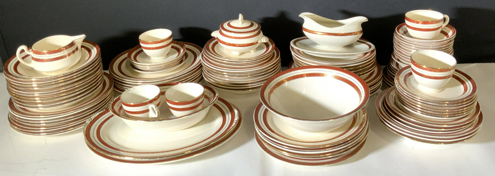 Set 104 NAUTILUS Signed Porcelain Dinnerware: 104 pieces of porcelain dinnerware. Undersides are signed NAUTILUS, MADE IN USA. Some are signed with a heart & read PACIFIC CHINA. On some pieces these signatures overlap. Each piece is comprised of 