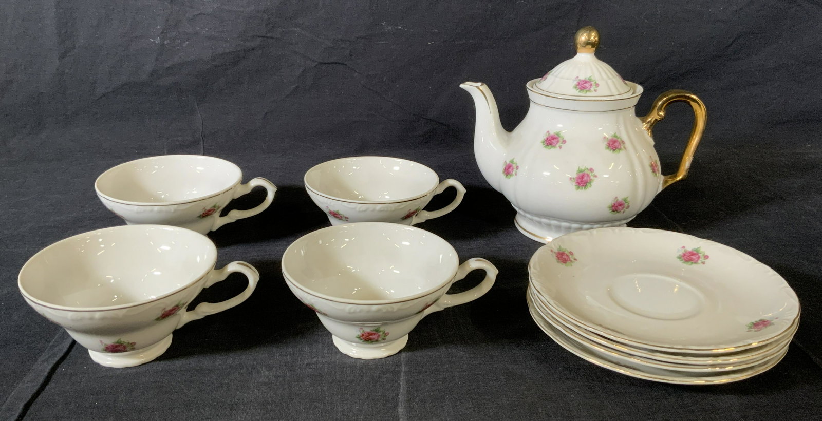 Set 9 MINAMIYAMA SEITOSHO Porcelain Tea Service: Set 9 MINAMIYAMA SEITOSHO Porcelain Tea Service, inscription to teapot reads ‘MINAMIYAMA SEITOSHO’, inscriptions to all other pieces reads ‘Japan’, teapot measures 6 1/2 inches tall x 7 3/8 in