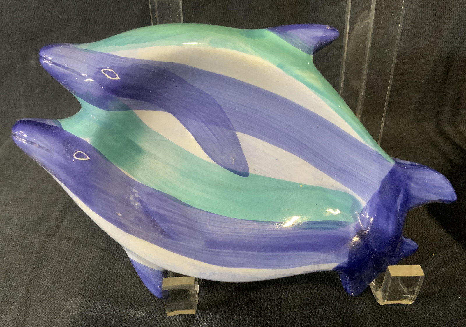 Lot 5 Ceramic Sea Life Trinket Dishes: Lot of 5 ceramic trinket dishes. Three of the dishes resemble pairs of dolphins swimming together, the other two resemble fish. Largest dish measures approx 6.5 inches long. Property of a multigenerat