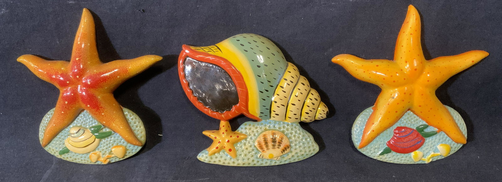 Lot 3 Vintage Hand Painted Magnets: Group lot 3 composite decorative magnet fish, most have tag to their reverse that reads ‘Made in China’, each is painted with its own design some cracks and wear to piece, largest of the three mea