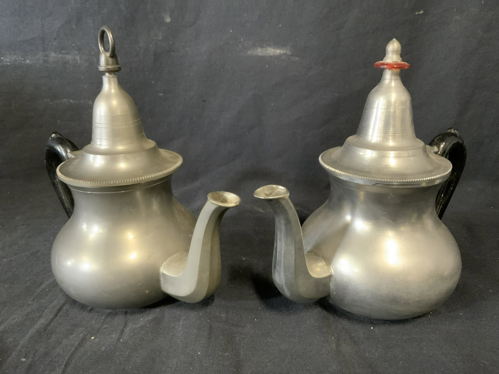 Lot 2 Vintage ETOILE DU SUD Metal Kettles: Lot includes two metal tea kettles, handles have been colored black. Underside of each kettle is inscribed and reads ETOILE DU SUD, an etching resembling a bee is carved into the underside as well. On