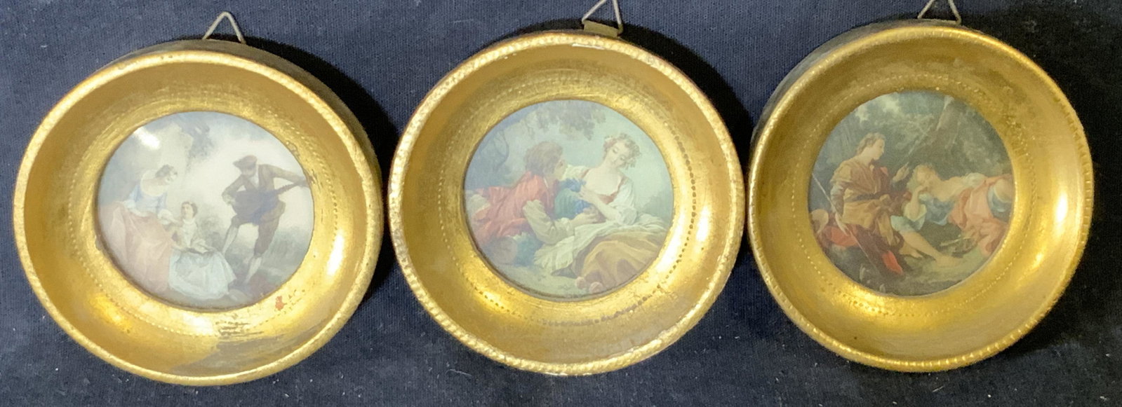 Collection 3 Offset Lithograph Miniature Artworks: Collection 3 offset lithograph miniatures, no apparent inscriptions or signatures , each depicts a rococo style scene with people in gardens, all have a gilt wood frames, all measure 3.25 inches in di
