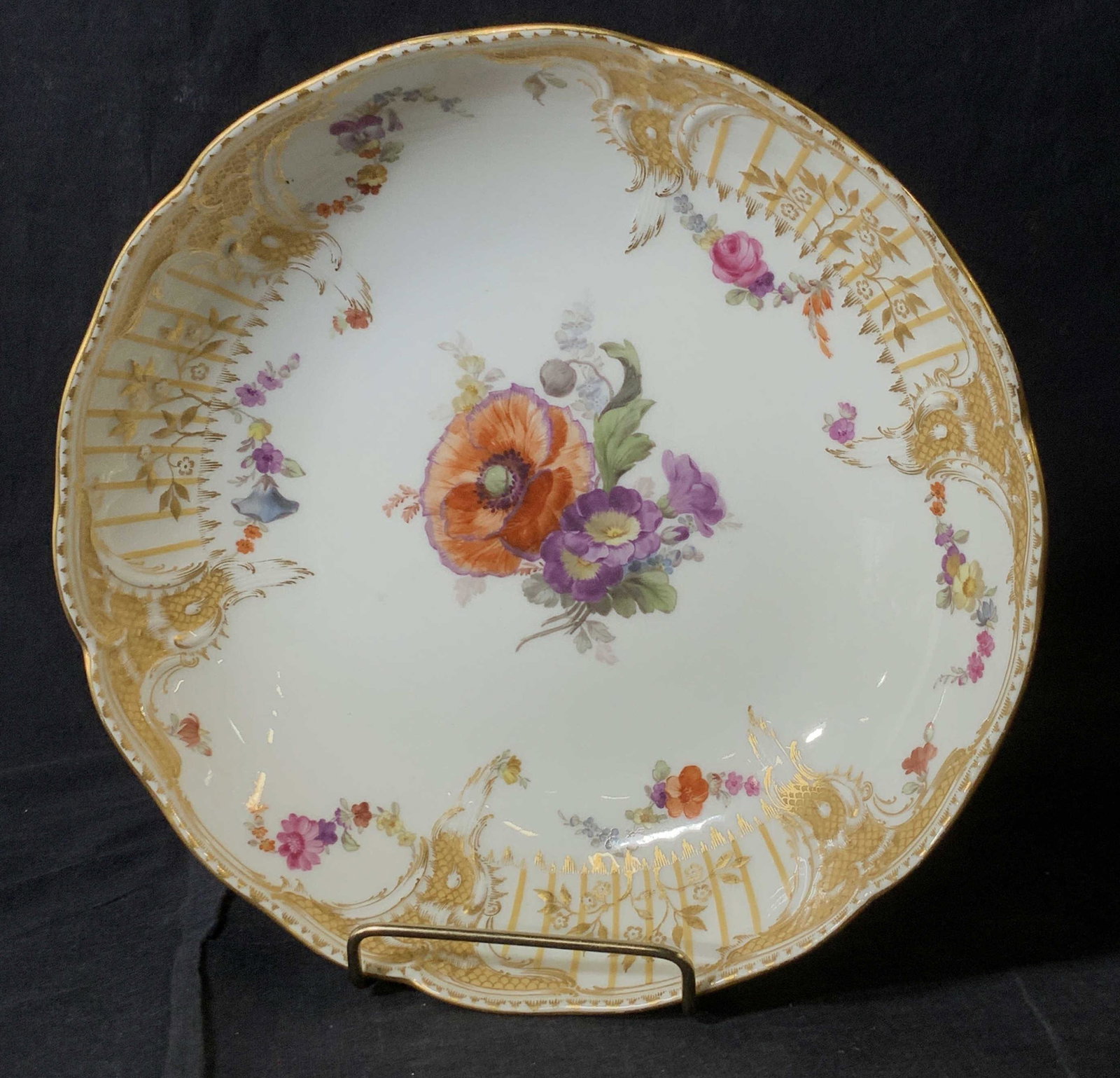 KPM Hand Painted Porcelain Bowl, Berlin Germany: Hallmarked Hand painted Bowl on white porcelain . Center purple and orange flower with detailed gilt border and rim. Victorian scrolls throughout. Underside stamped under glaze with KPM , additional b